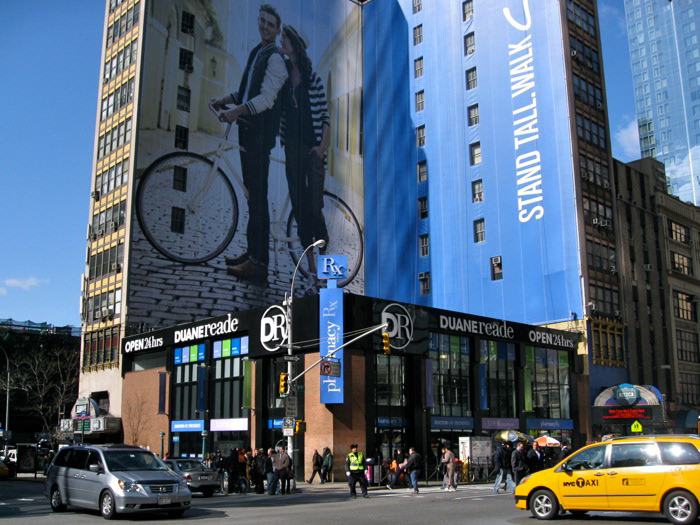 Actual photo of designed storefront and signage (also interior) in Times Square, NYC, 2012