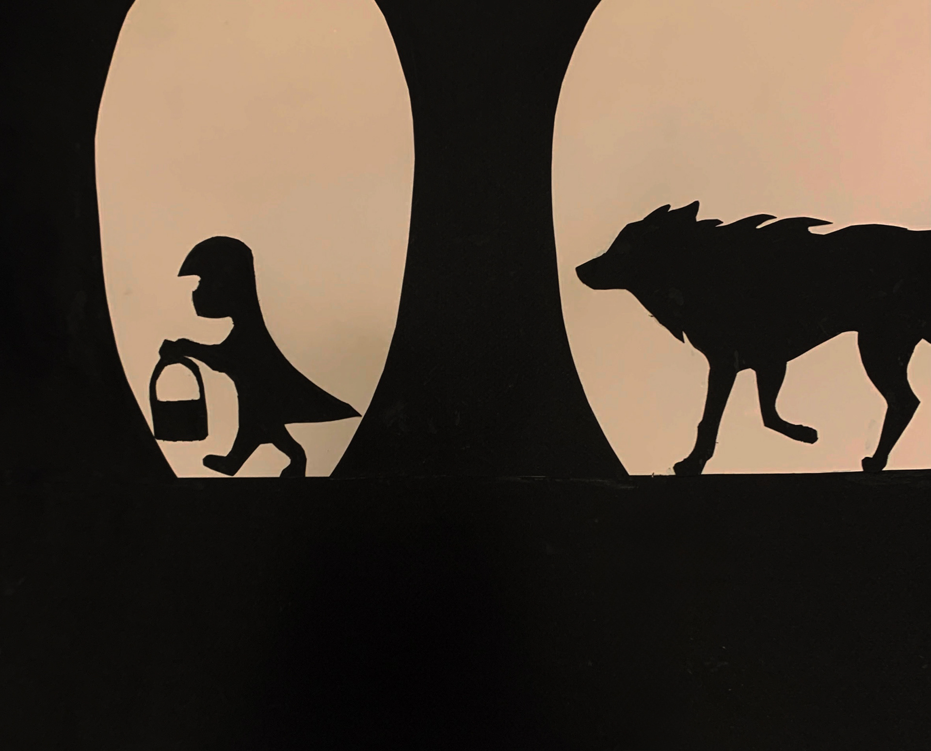 The Wolf stalking Little Red Riding Hood - paper silhouette 