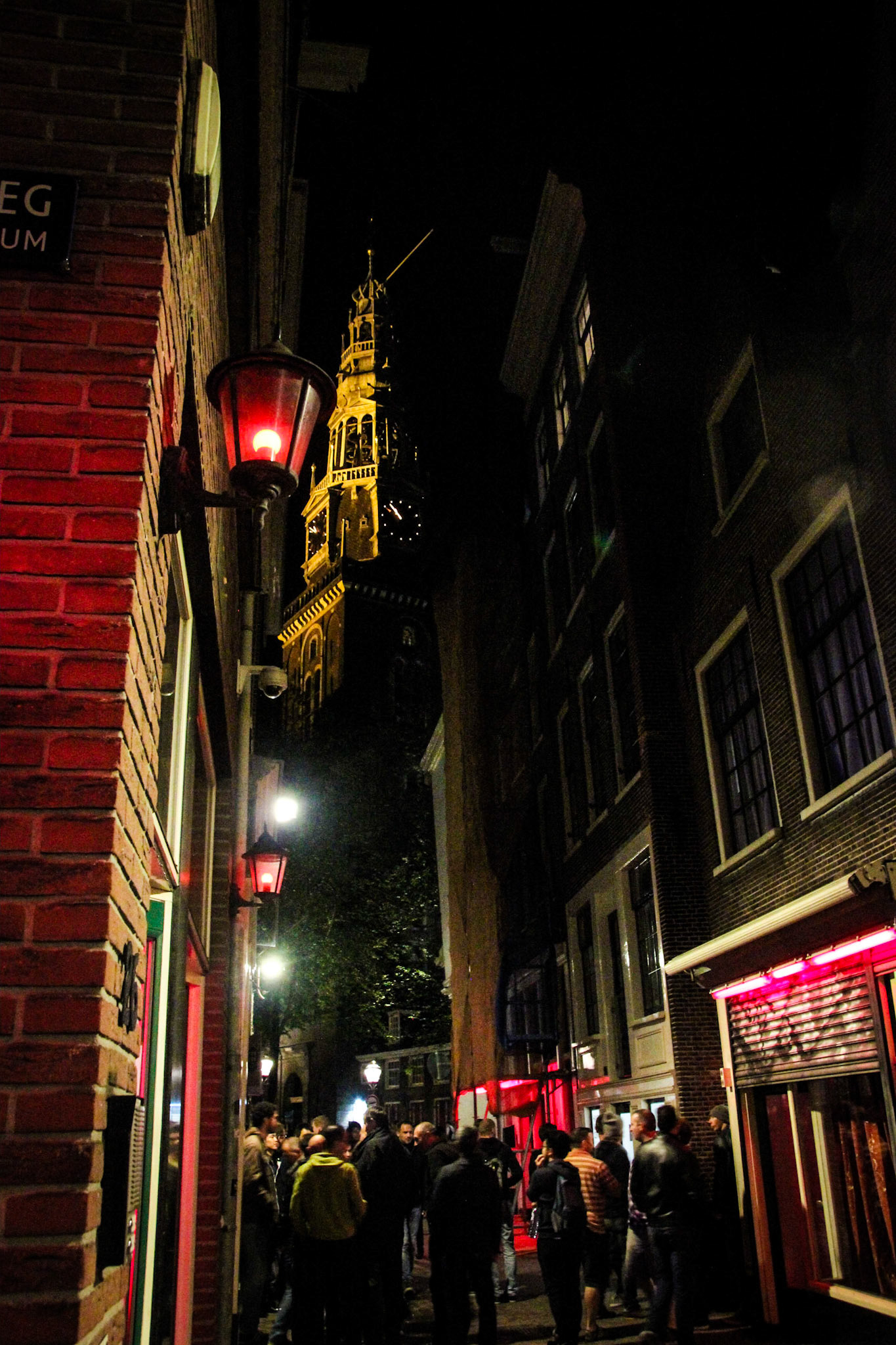 The Oude Kerk (Old Chruch) looks down on Amsterdam's Red Light District Partiers and Thrill-Seekers
