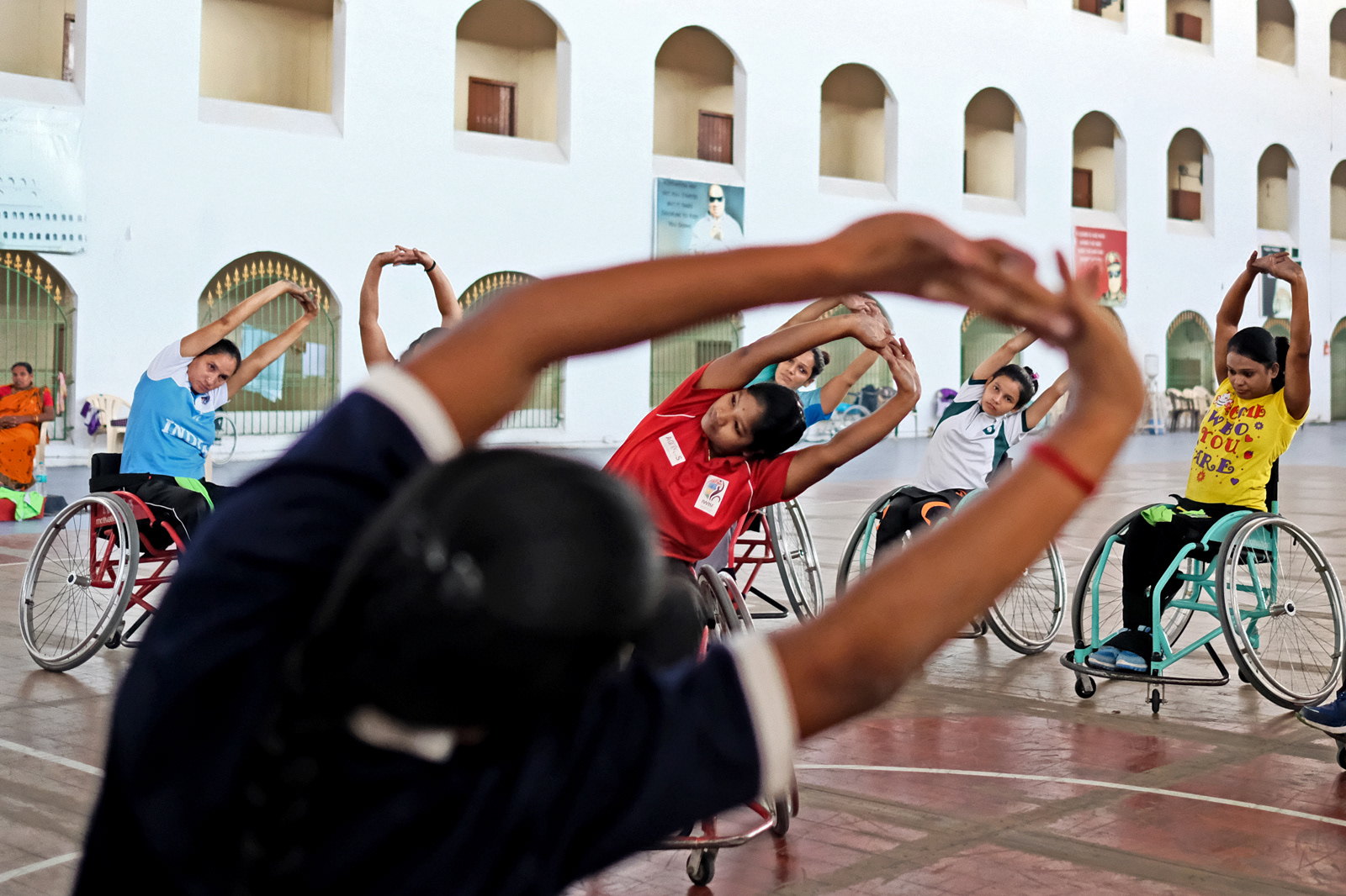 Hindu Alayamani (centre) leads the shortlisted candidates in stretches, something that all top flight athletes regard with great seriousness.