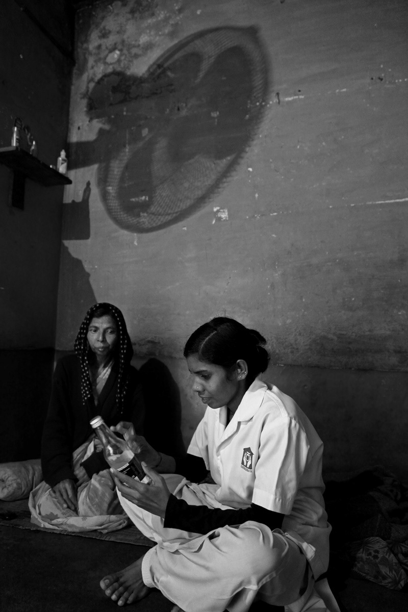 Accessing morphine for pain relief is one of the biggest challenges for institutes offering palliative care in India. A homecare nurse labels a bottle of oral morphine solution to prevent accidental use.