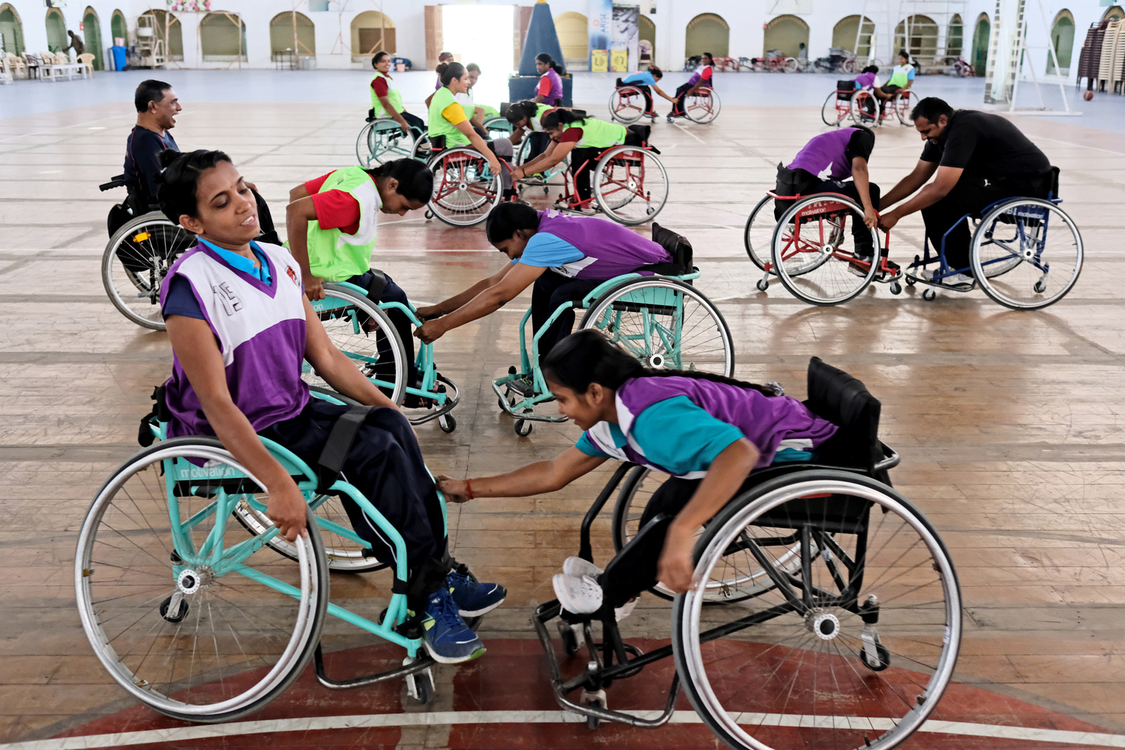 Nisha Gopalakrishnan from Kerala and A. Kanagalakshmi from Tamil Nadu attempt to pull each other in opposite directions as part of their warm ups.