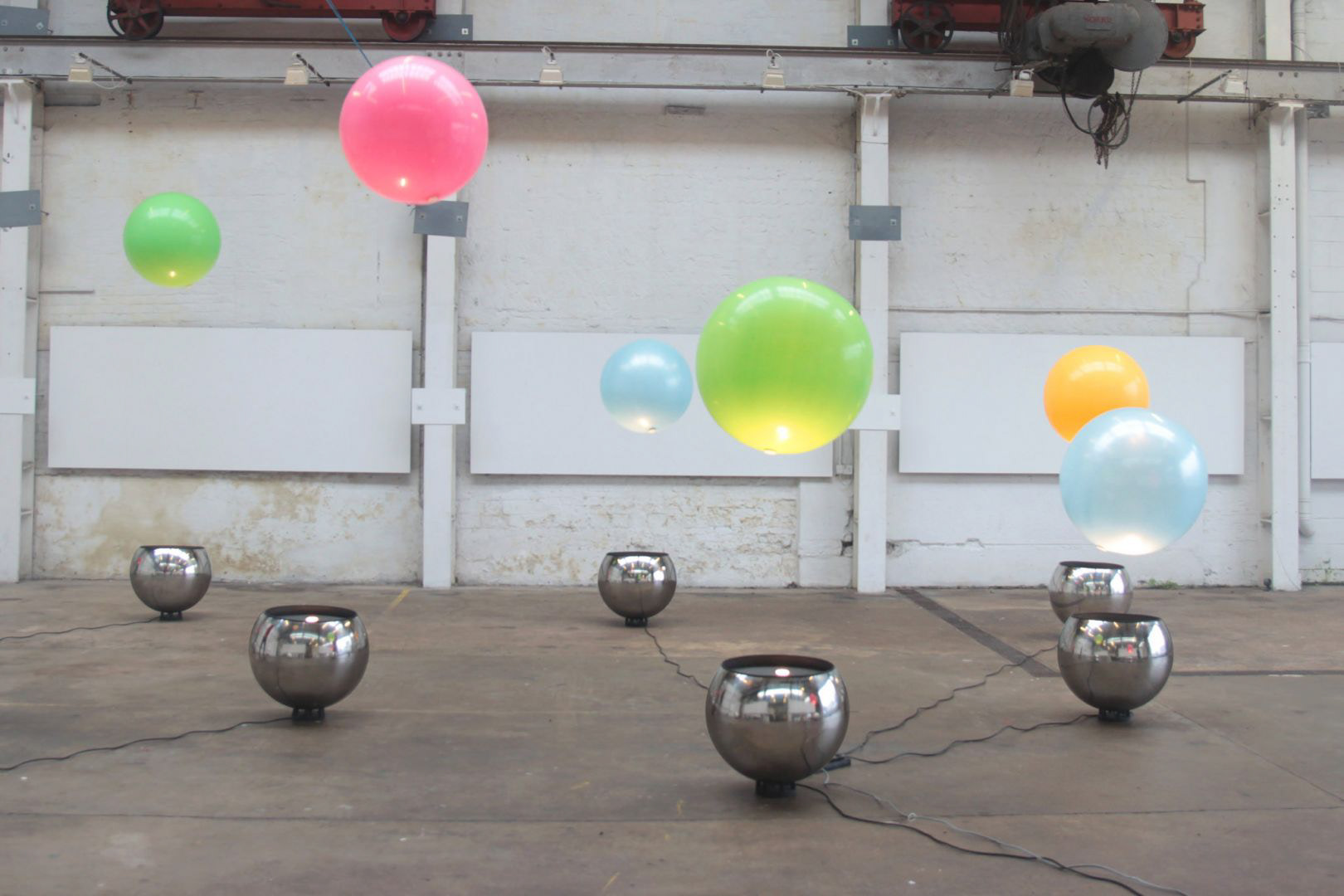 Can be found at: https://www.creativeboom.com/inspiration/interactive-installation-that-lets-you-play-with-giant-colourful-orbs-that-levitate-in-mid-air/