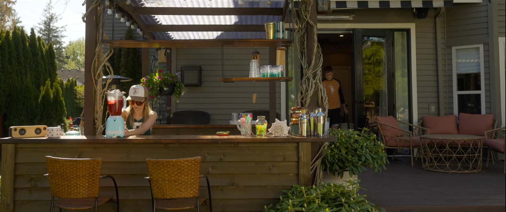 EXT COUSIN'S BACKYARD - On-Screen