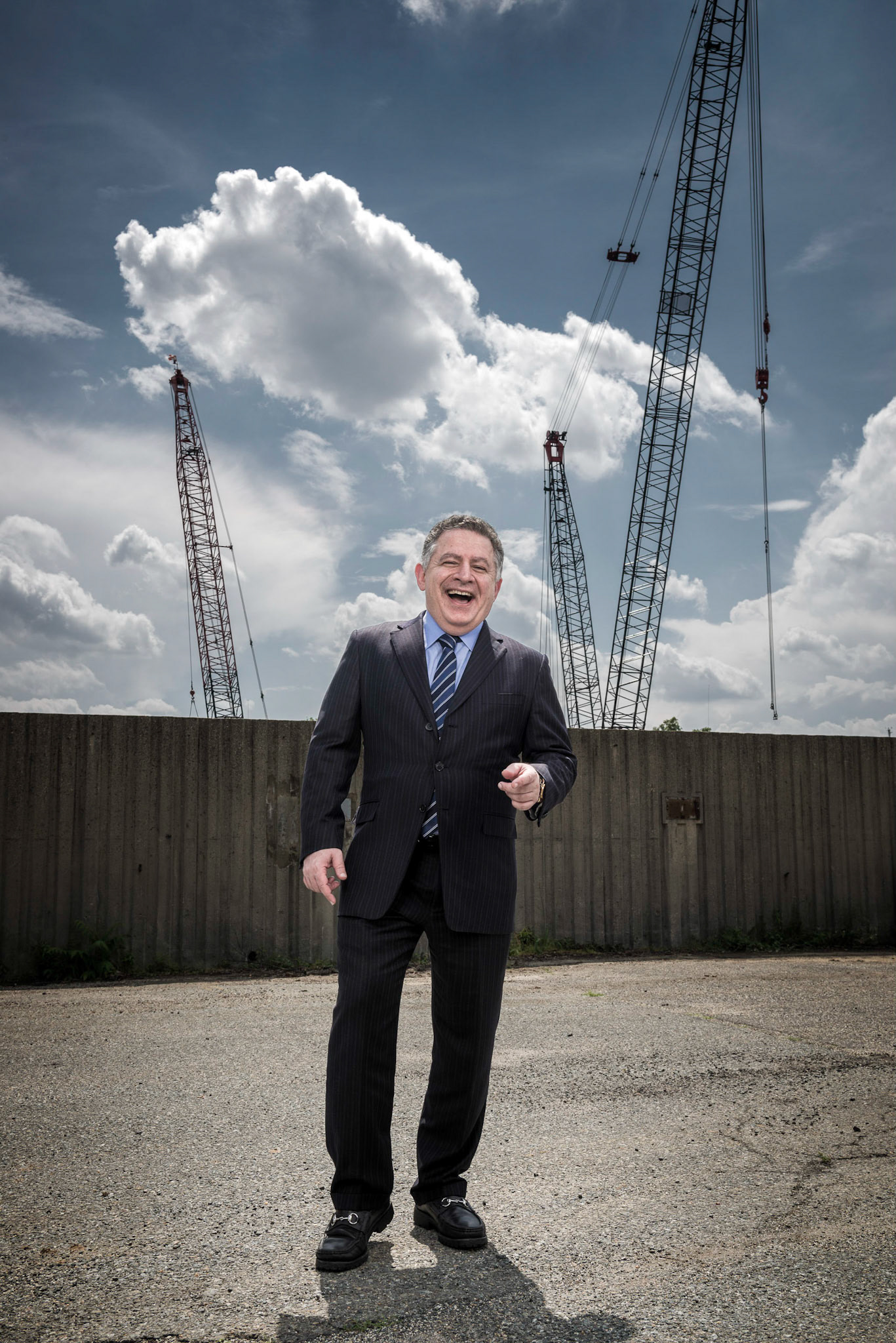 WASHINGTON, DC - MAY 28: Amer Hammour , CEO of developer Madison Marquette Portrait taken the afternoon of May 28th 2014, at The Wharf Approximately 9th St. SW and Water St. SW, Washington, DC 20024, Portrait of Amer Hammour at the construction site for the new southwest waterfront project, The Wharf, for an article about the people behind the recent boom of construction in DC. (Photo by Brad Howell for the Washington Post)