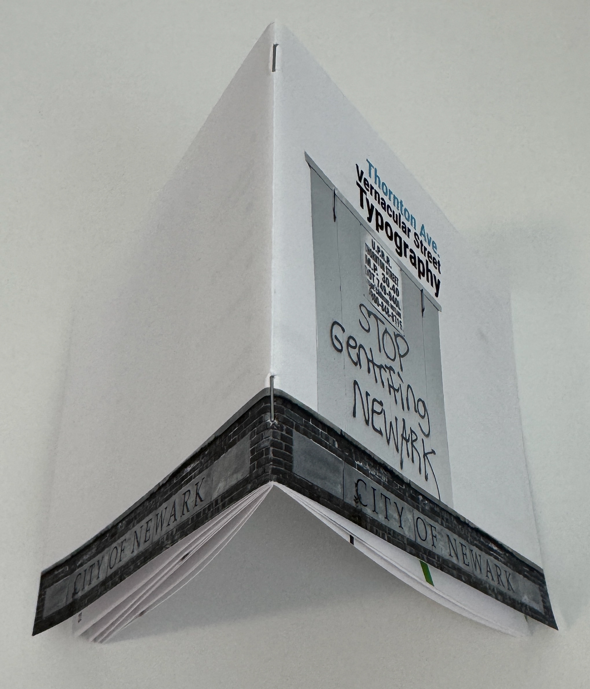 Showing the small size of booklet