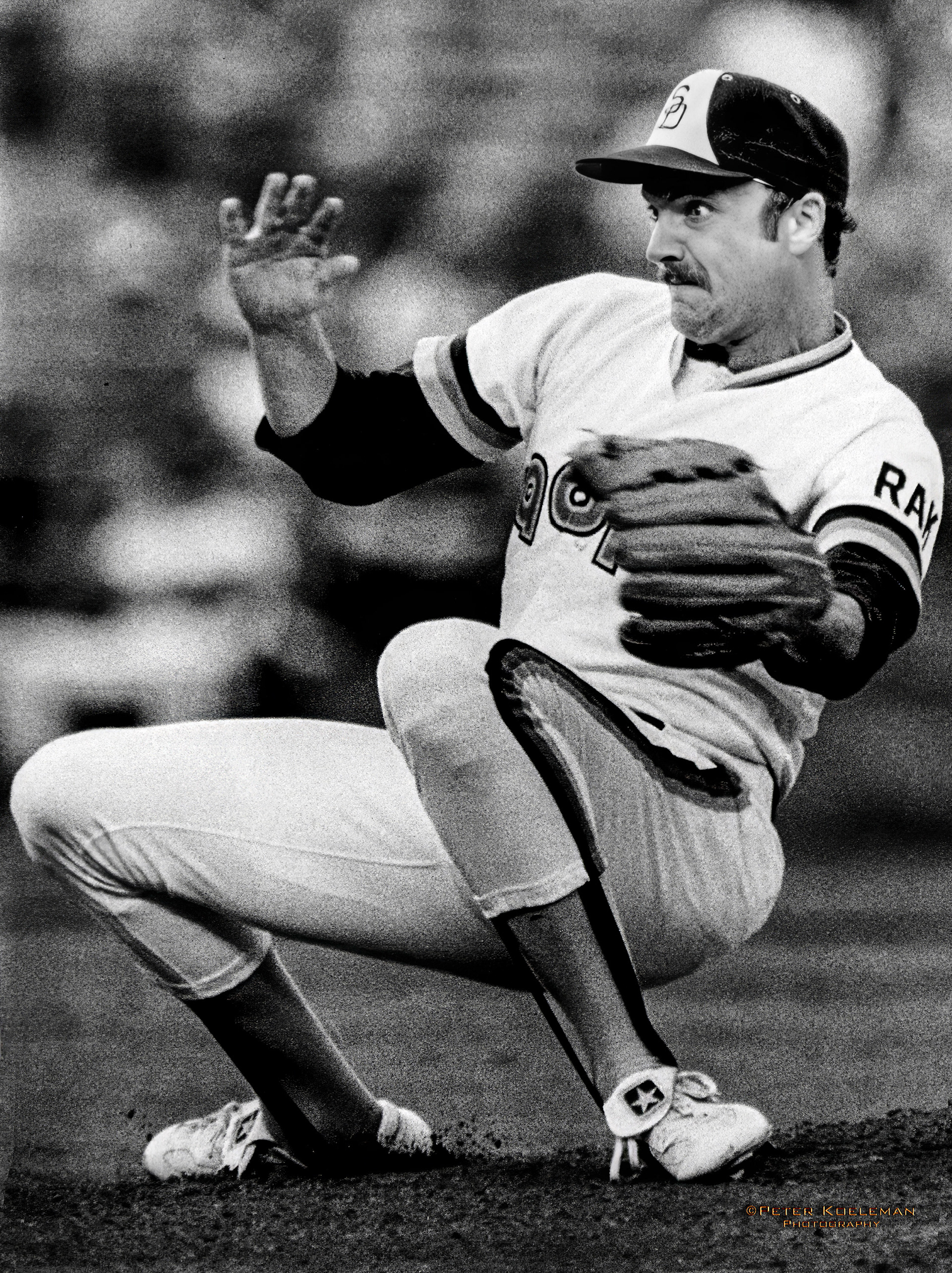 San Diego Padre pitcher Ed Whitson reacts to a hit ball coming back at him - 1984