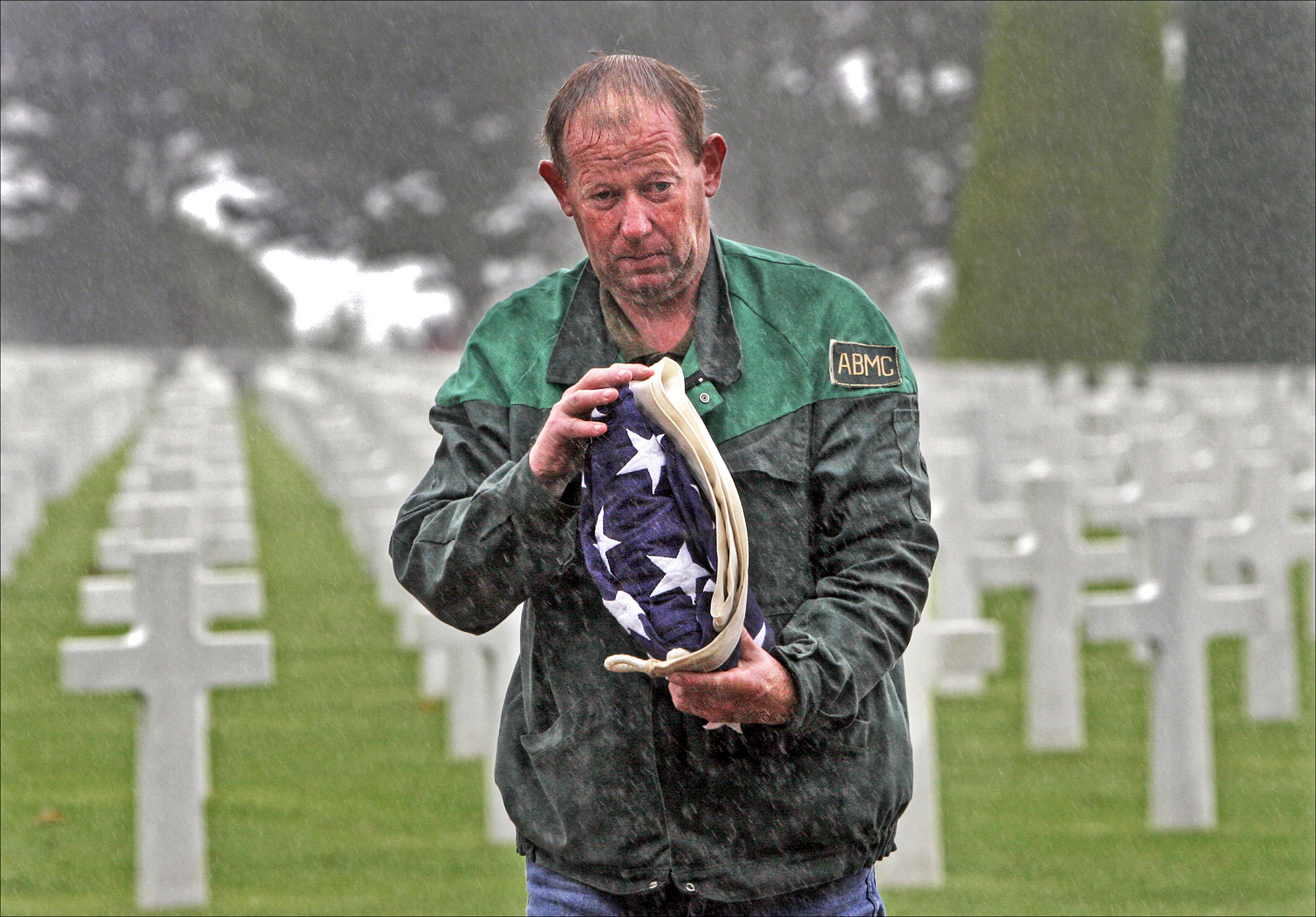 Taking Down the Flag at the American Cemetery in Normandy