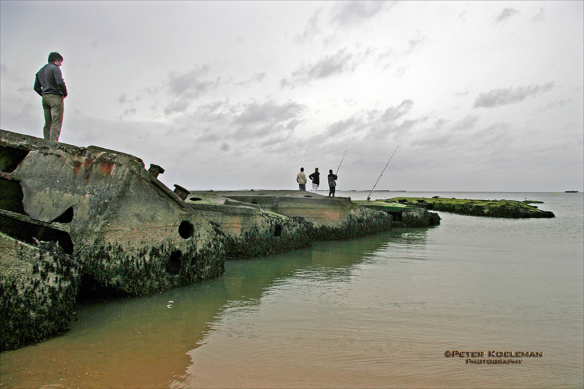 Fishing off a Mulberry Harbor  - Arromanches-les-Bains, Normandy