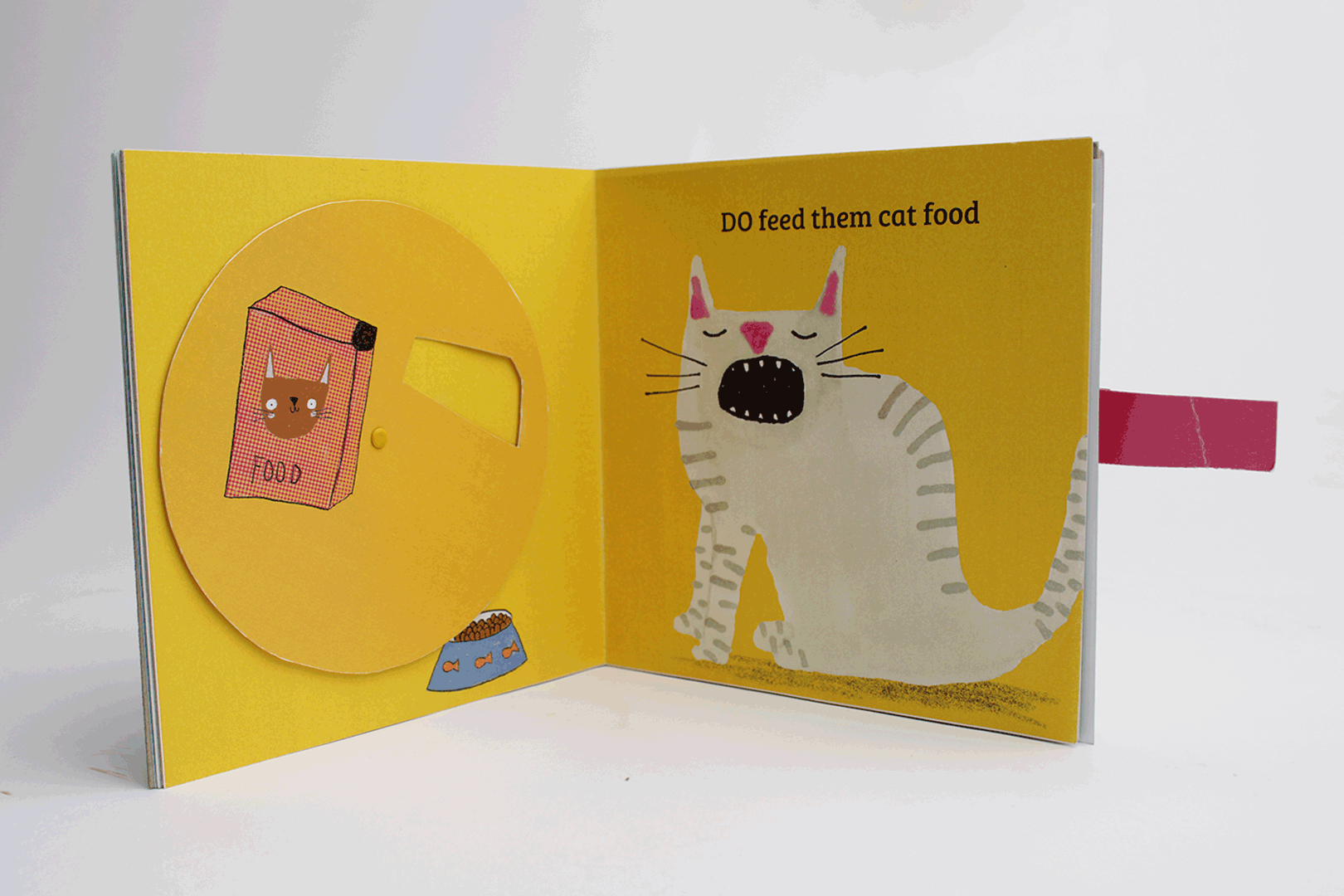 A page from my university project book 'How NOT to Look After Your Cat'