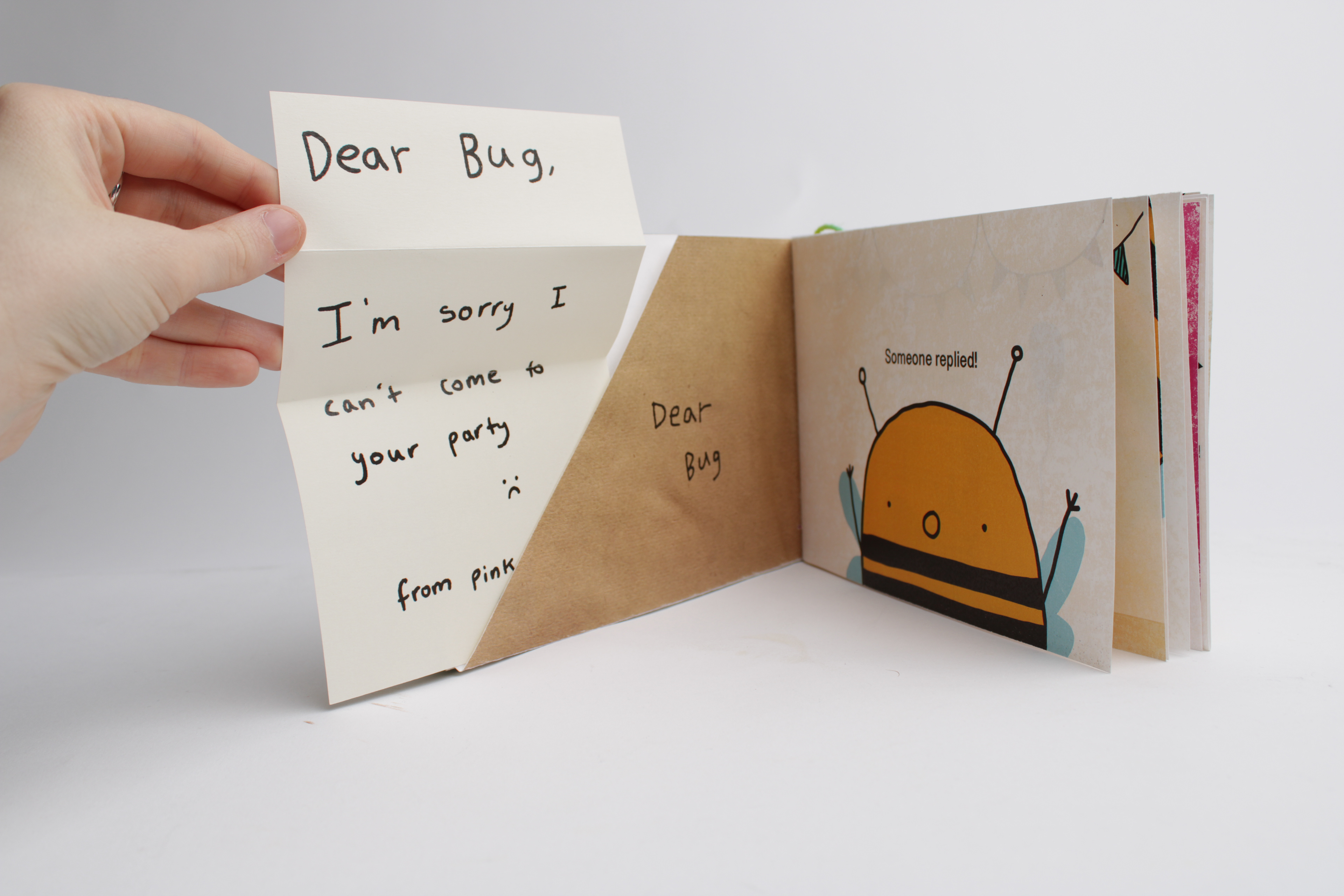 There are pull out letters throughout the book allowing the audience to follow the protagonist through his journey and allowing them to do the same.