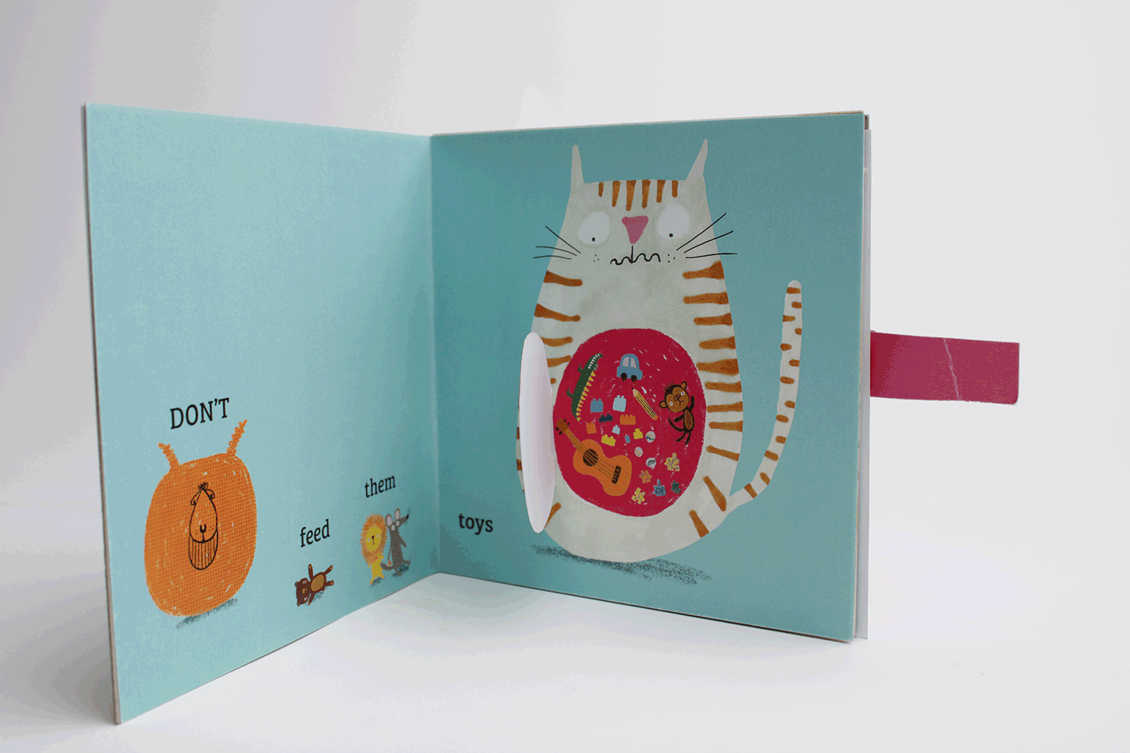 A page from my university project book 'How NOT to Look After Your Cat'