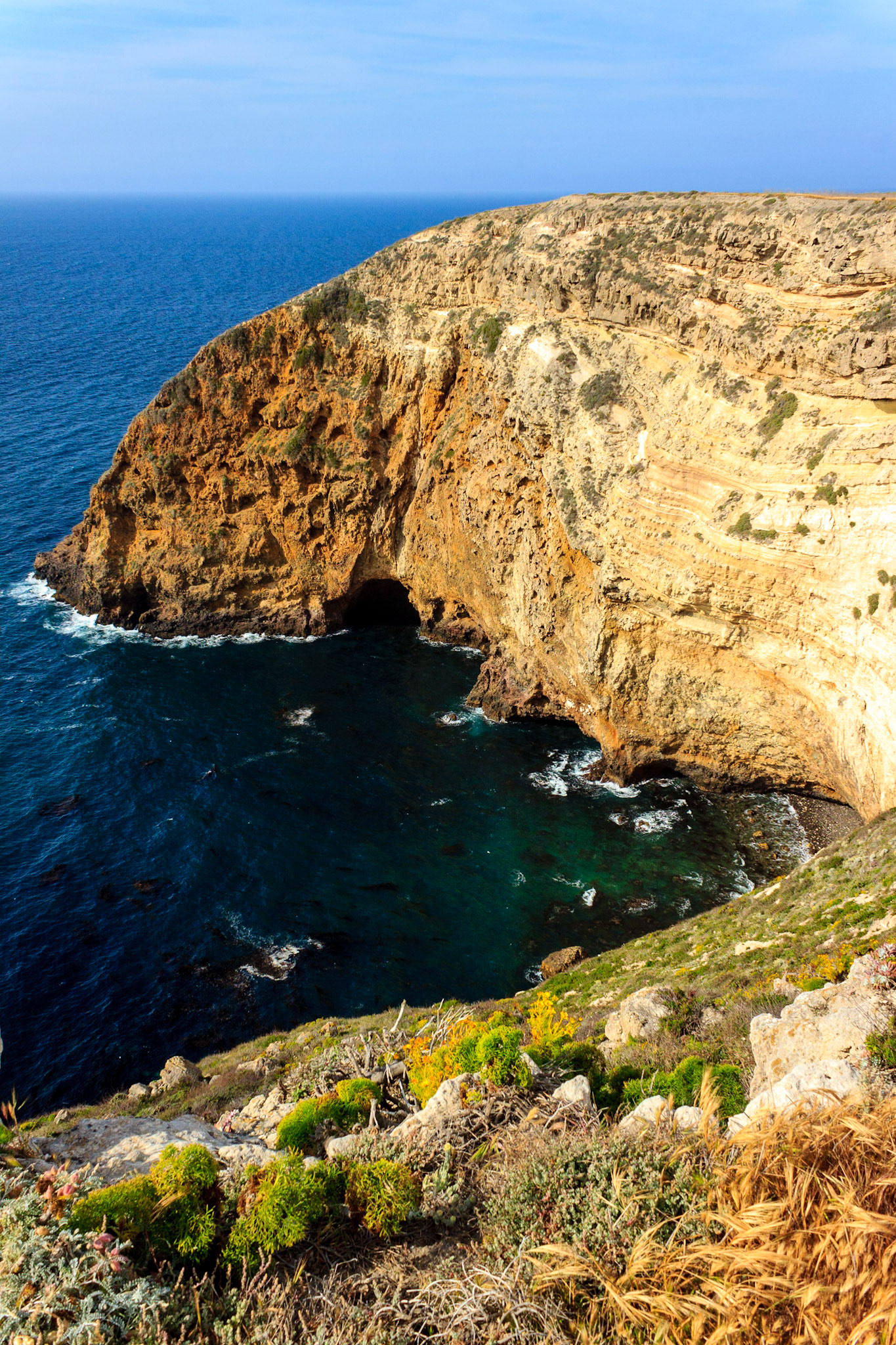 Sea caves along the shoreline.