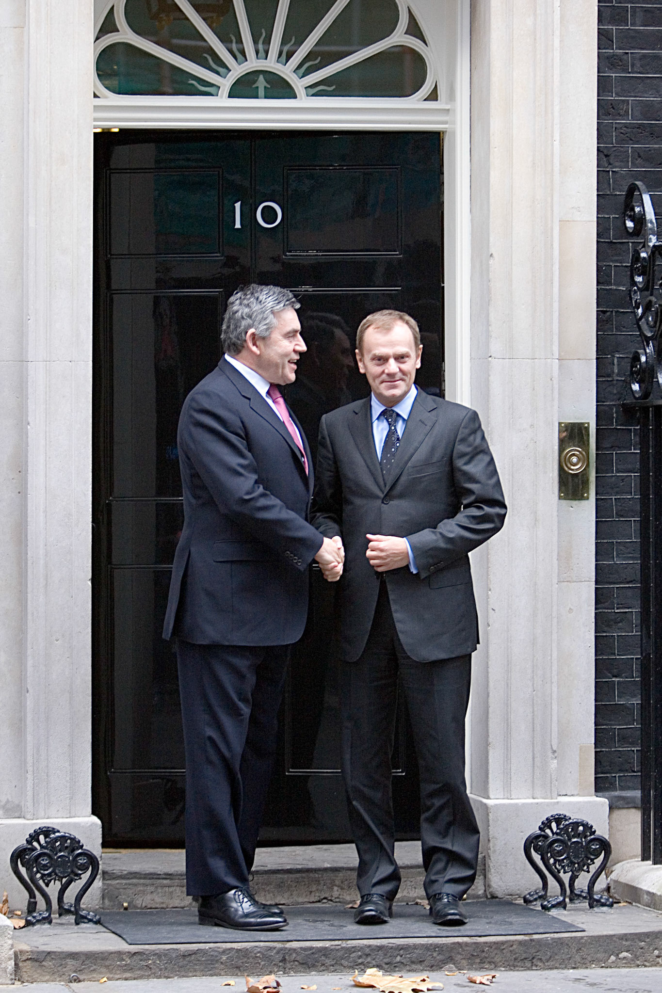 British Prime Minister Gordon Brown leaves Number 10 Downing Street to greet the Prime Minister of Poland, Donald Tusk 