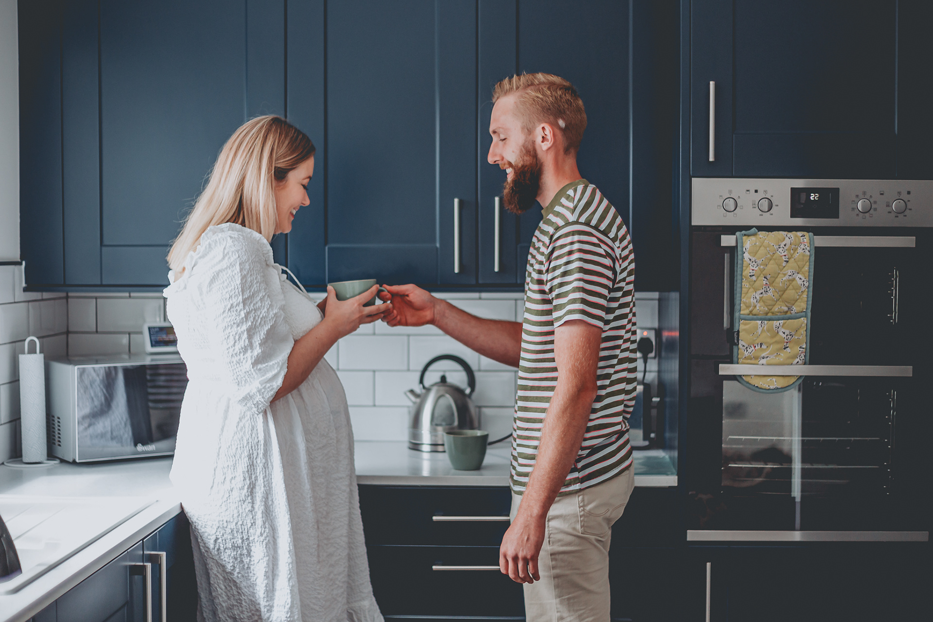 indoor couples lifestyle maternity photoshoot in a park and at home in Stoke with pet