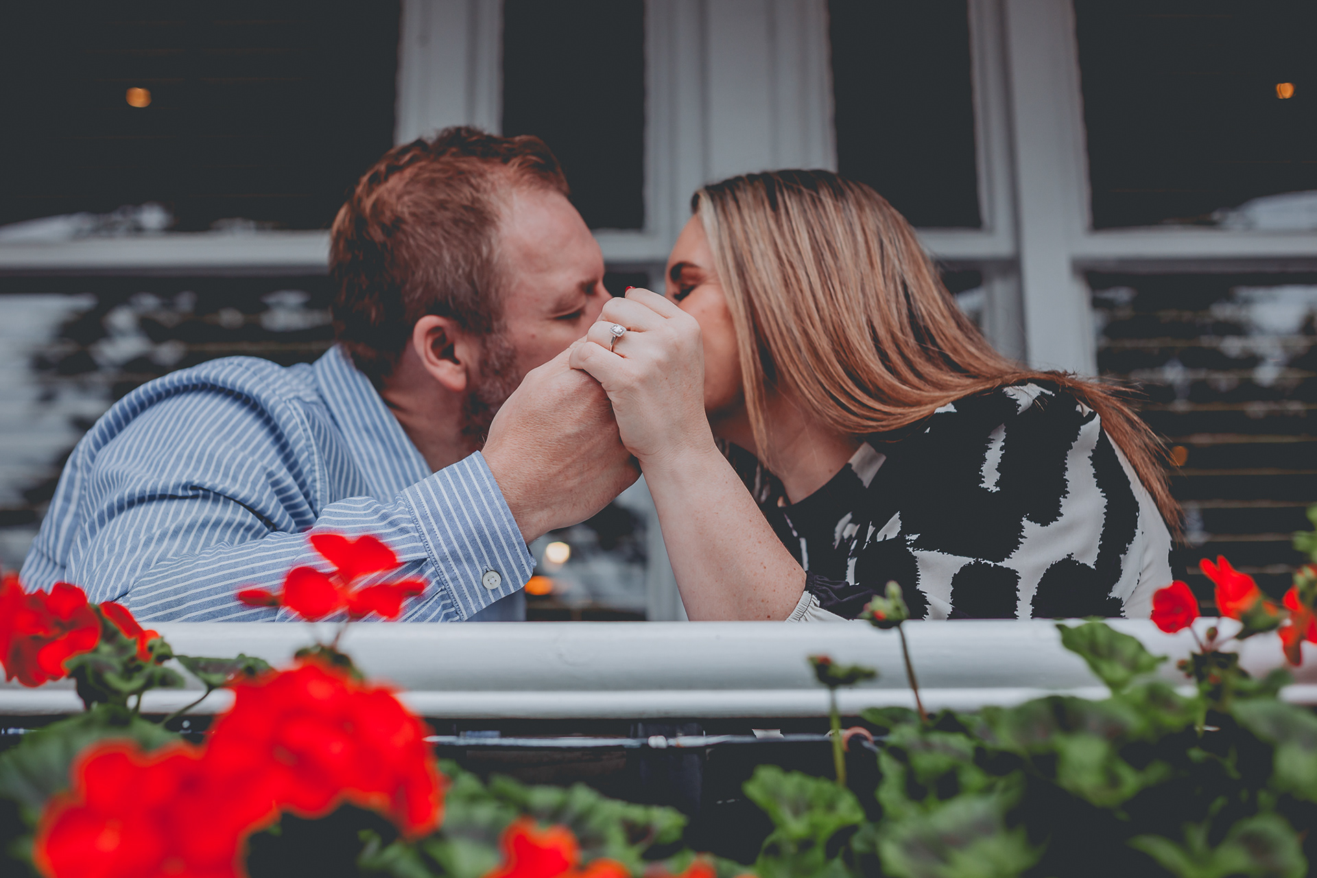 Natural, relaxed engagement shoot Chester, engagement ring, kiss