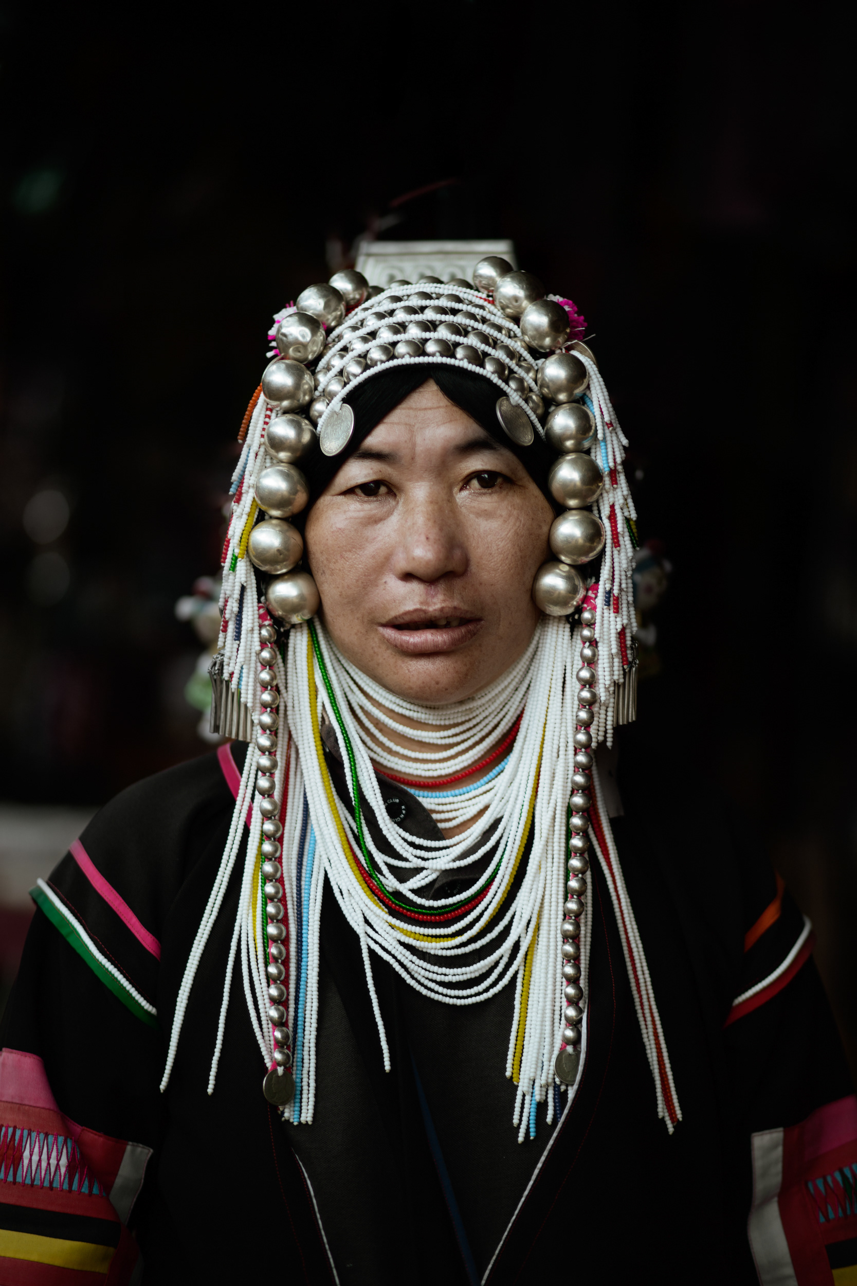 Portrait of a woman from the Akha tribe or the Kaw in the hills of Thailand