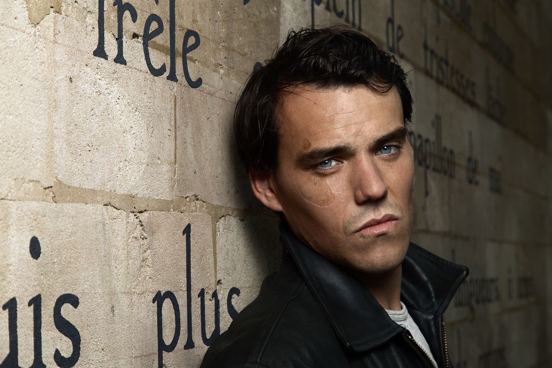 Portrait of actor Clovis Fouin in the streets of Paris with verses from Rimbaud