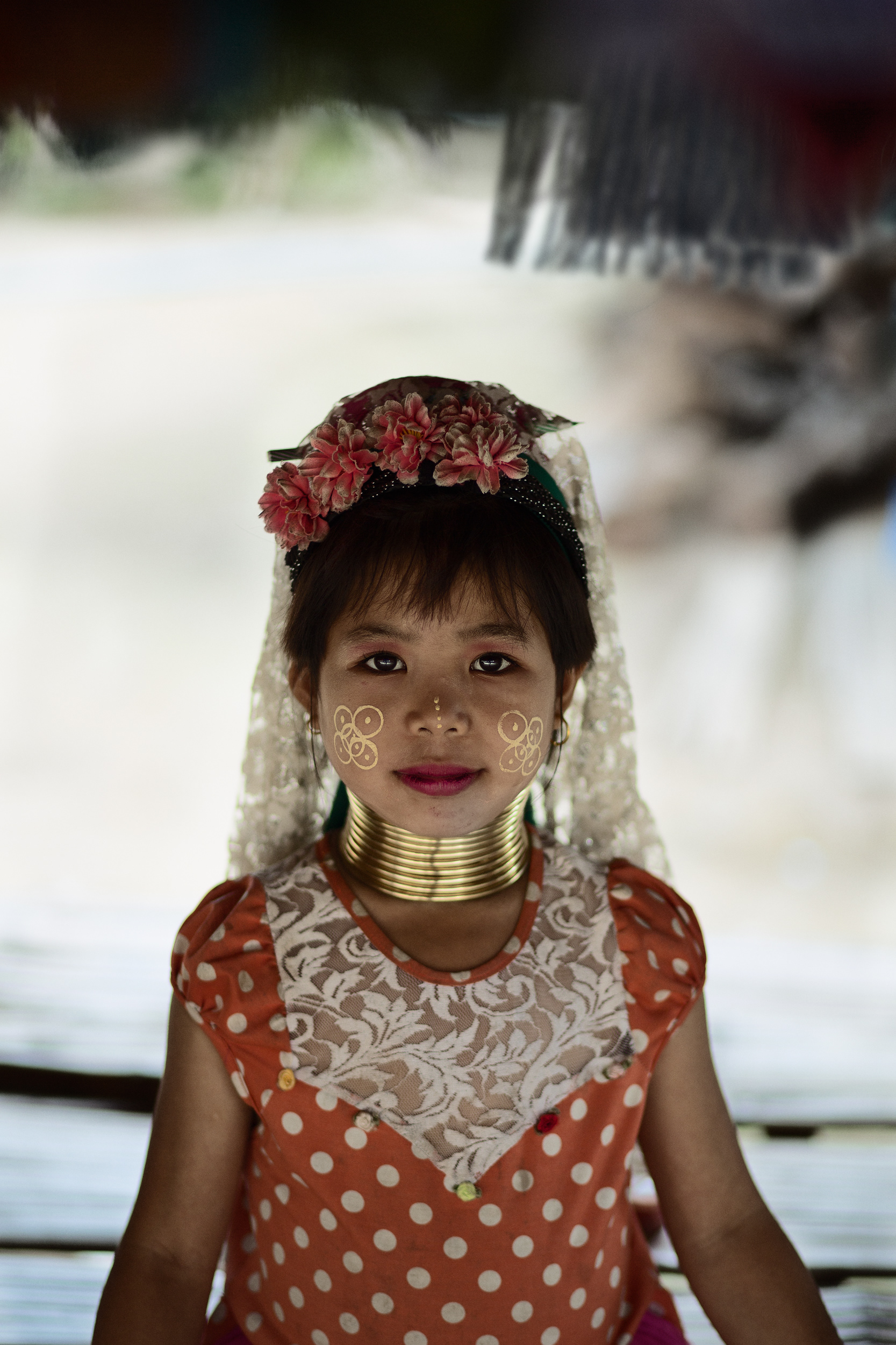 Portrait of a girl from the Kayan tribe a minority, also known as giraffe tribe