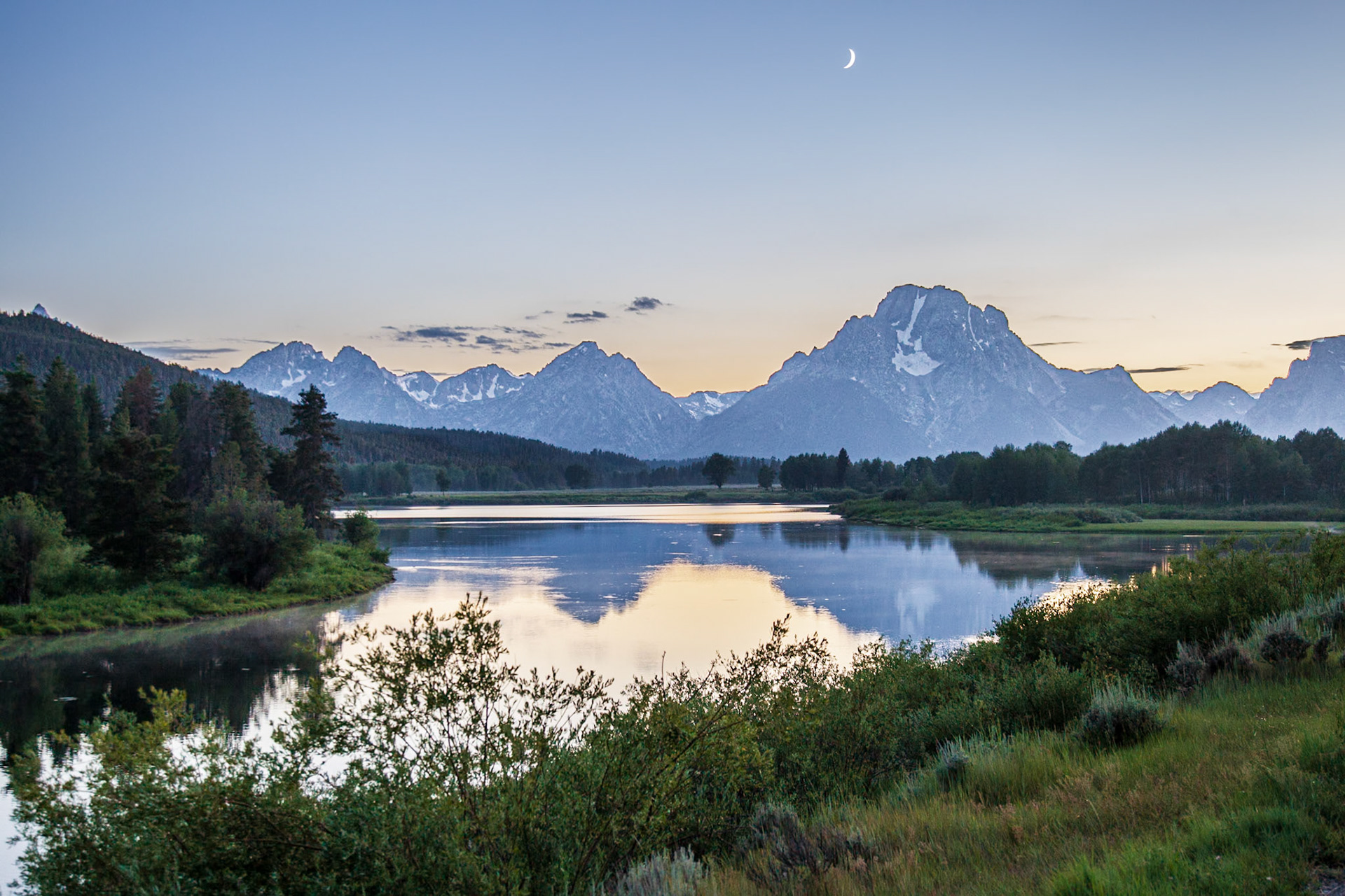 Moon over river, Yellowstone National Park, Wyoming