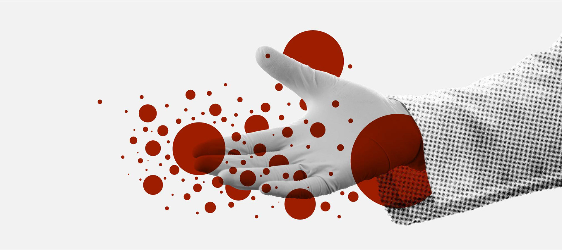 Image of a gloved hand surrounded by red bubbles