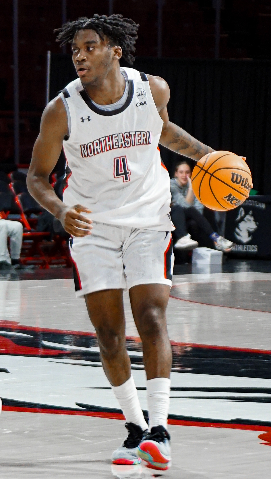 #4 Rashad King takes the ball to center court.