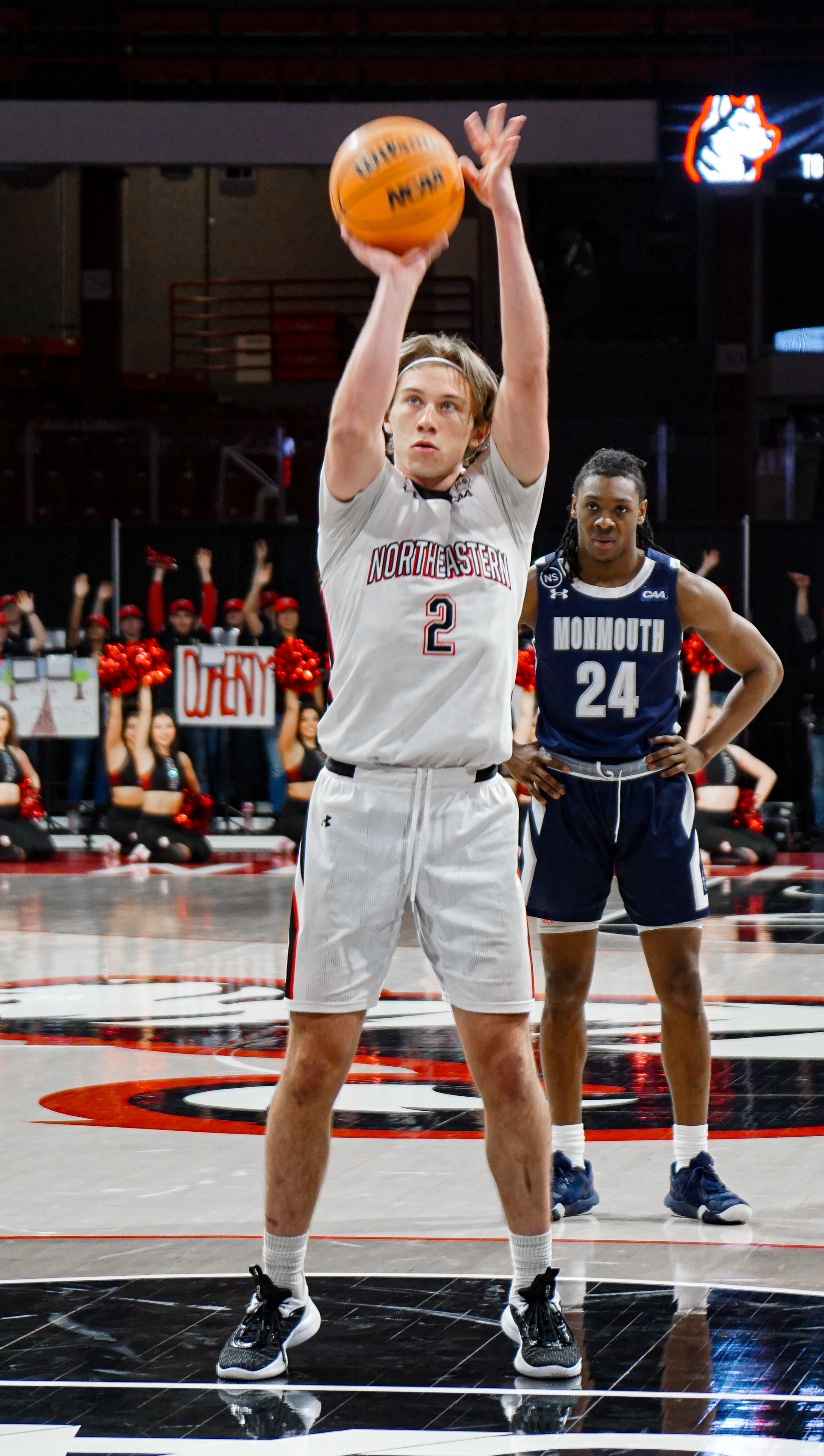 #2 Glen McClintock takes a shot from the free throw line.