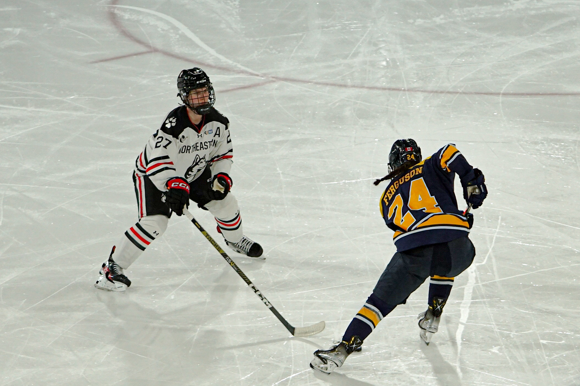 #27 Megan Carter defends against Merrimack.