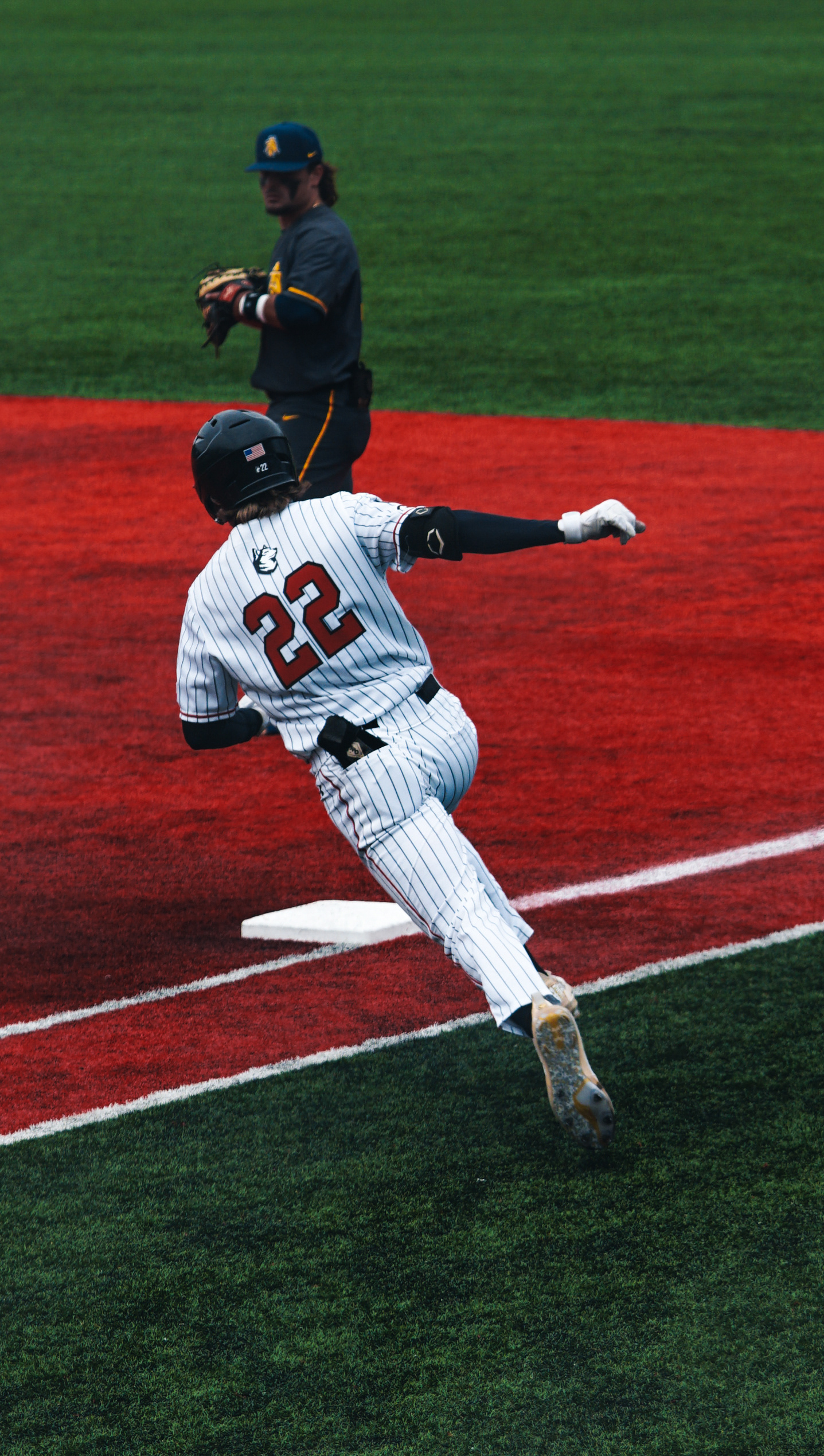 #22 Spencer Smith makes it to first first base.