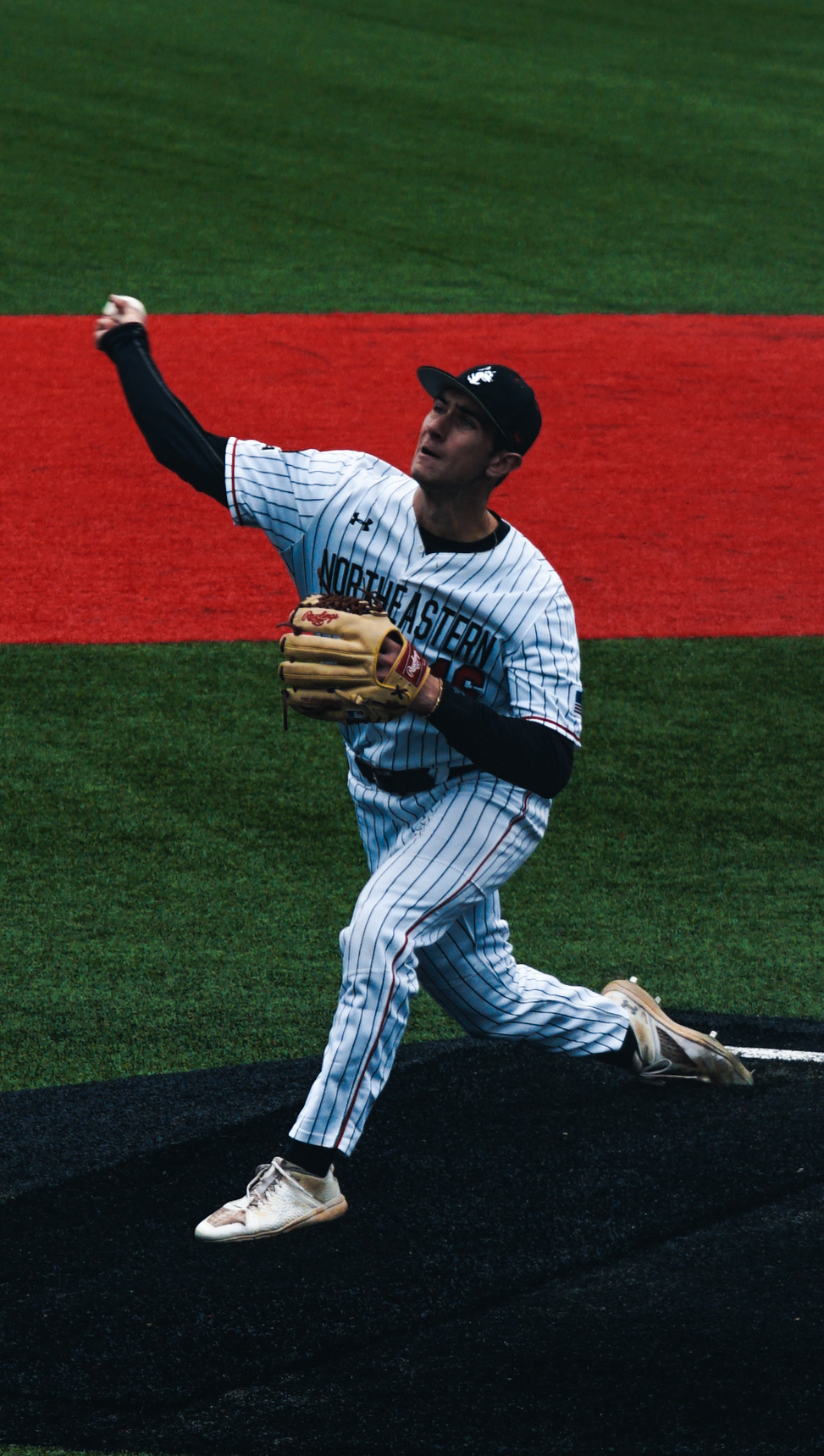 #46 Wyatt Scotti pitches on the mound.