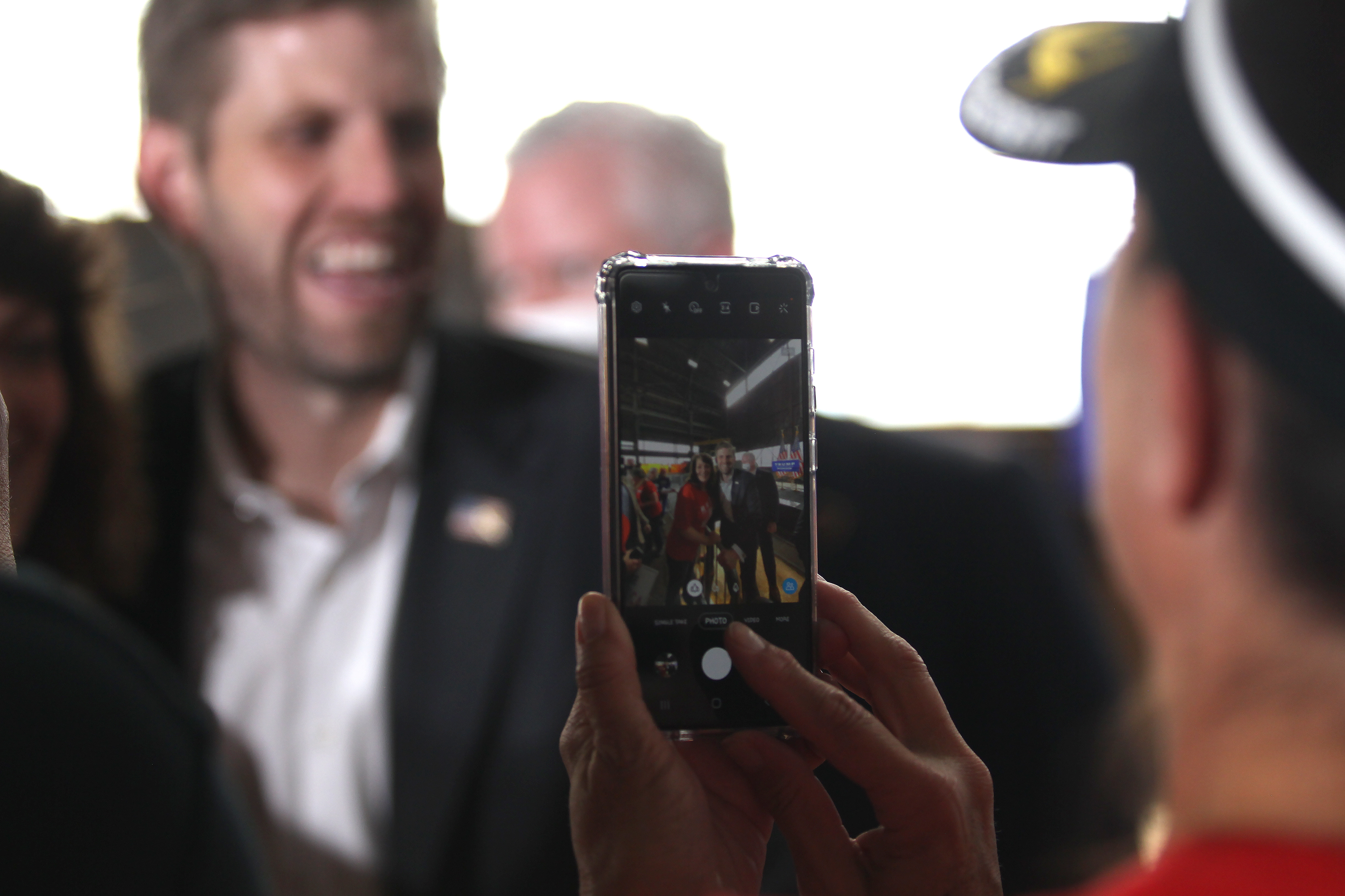 AMBRIDGE, PA - OCTOBER 22: An attendee of the Make America Great Again Rally takes a photo with Eric Trump while he was in Ambridge, PA on October 22, 2020. (Photo by Michael Longo/Icon Sportswire)