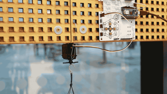 Transmit blow signal to the motor, driving the wind chime
