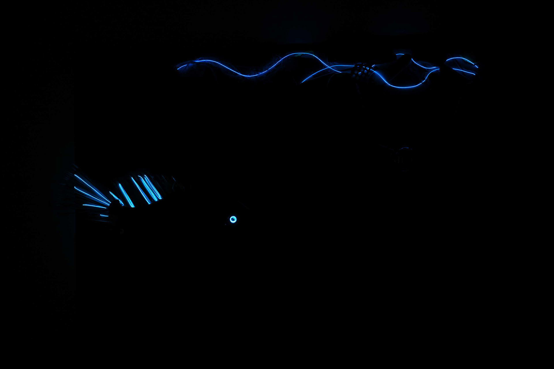 Blue bioluminescent lighting effect in Plastic from the Abyss deep-sea fish sculpture installation