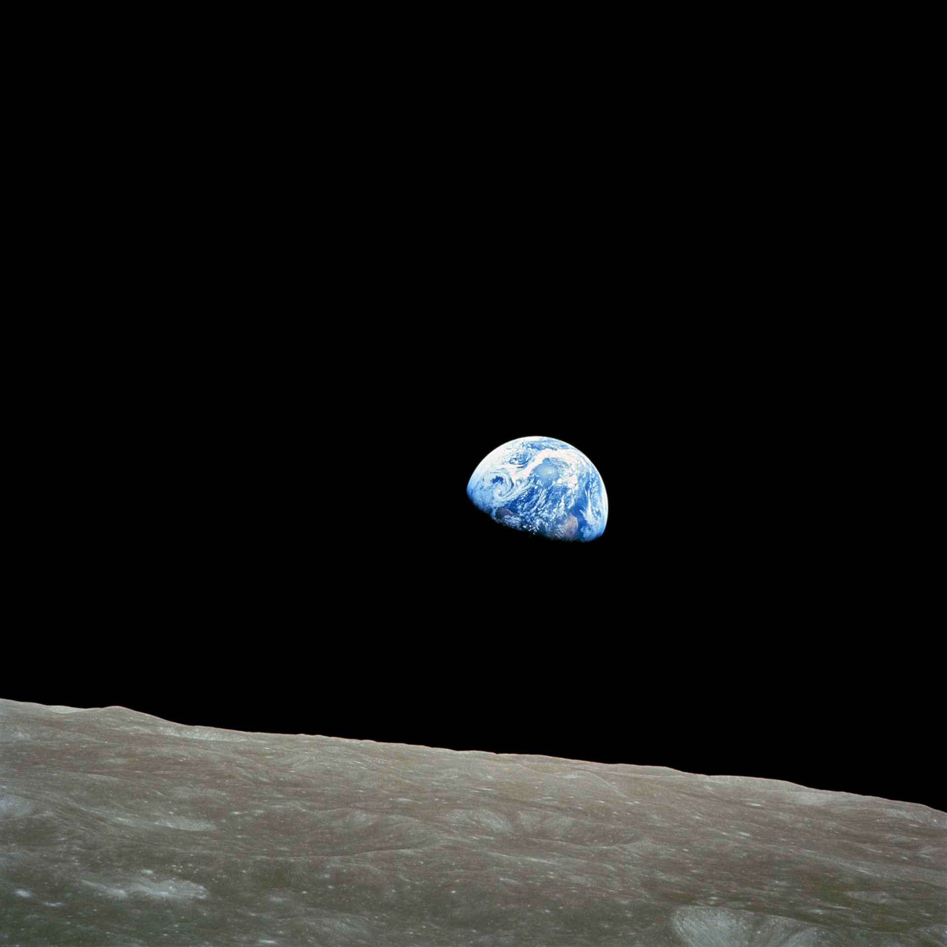 This iconic picture shows Earth peeking out from beyond the lunar surface as the first crewed spacecraft circumnavigated the Moon. Taken aboard Apollo 8 by Bill Anders, this iconic picture shows Earth peeking out from beyond the lunar surface as the first crewed spacecraft circumnavigated the Moon, with astronauts Anders, Frank Borman, and Jim Lovell aboard. Image Credit: NASA