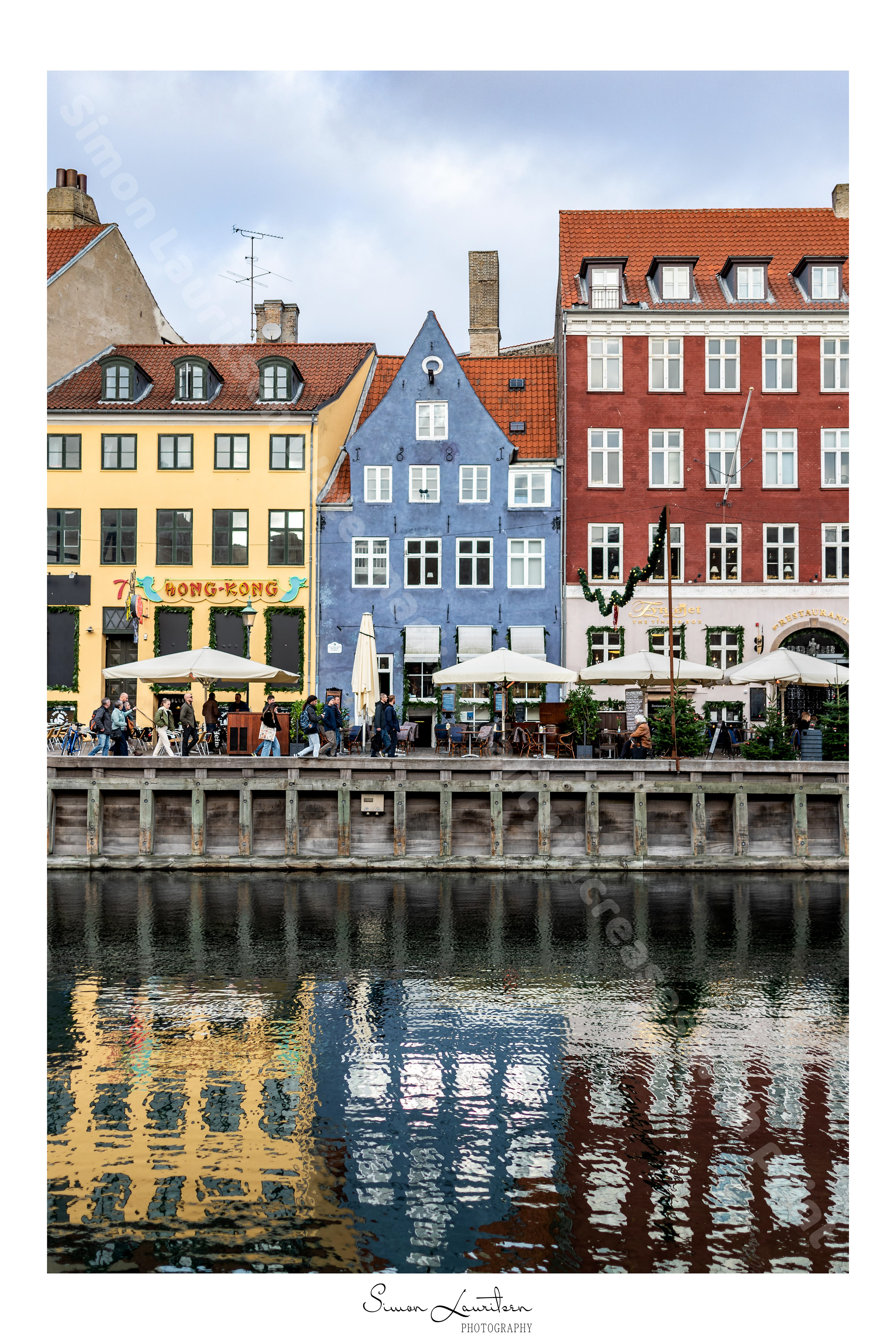 CITY-6: Went for a walk through Copenhagen and ended up at the beautiful Nyhavn. The reflections in the water and the covers of the houses are just perfect