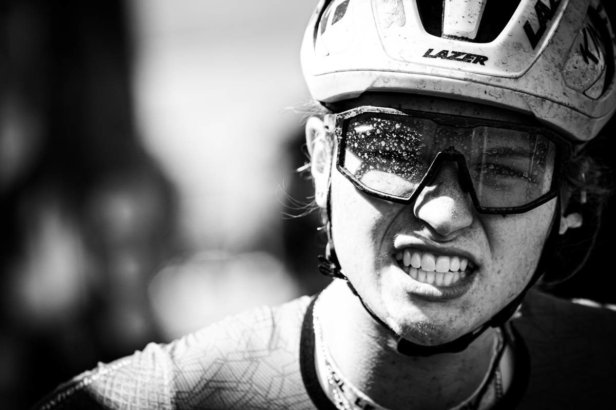 Cyclist Lucy Gadd at the finish line of the Tour of Britain in Glasgow 2025, shot with a vintage Olympus OM-1 camera and HP5 black and white film
