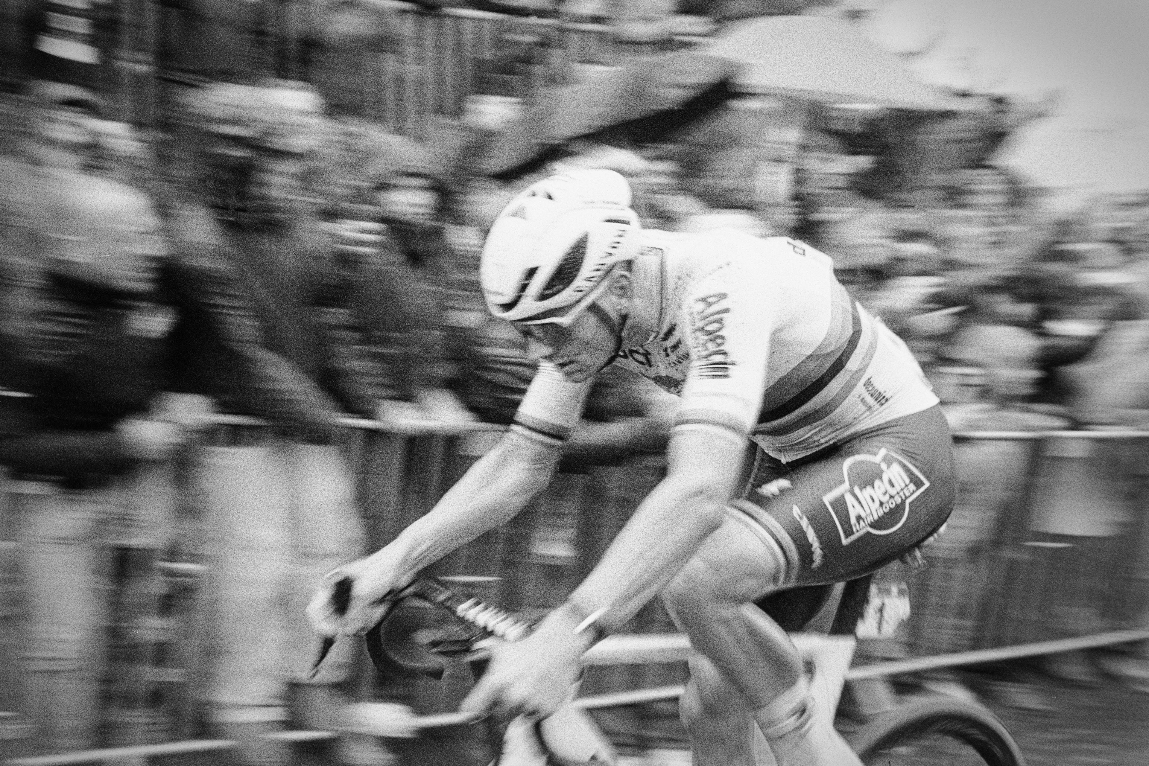 World Champion Mathieu van der Poel storms to Tour of Flanders victory on the iconic Oude Kwaremont. Shot on a vintage Olympus Trip camera and HP5 black and white film