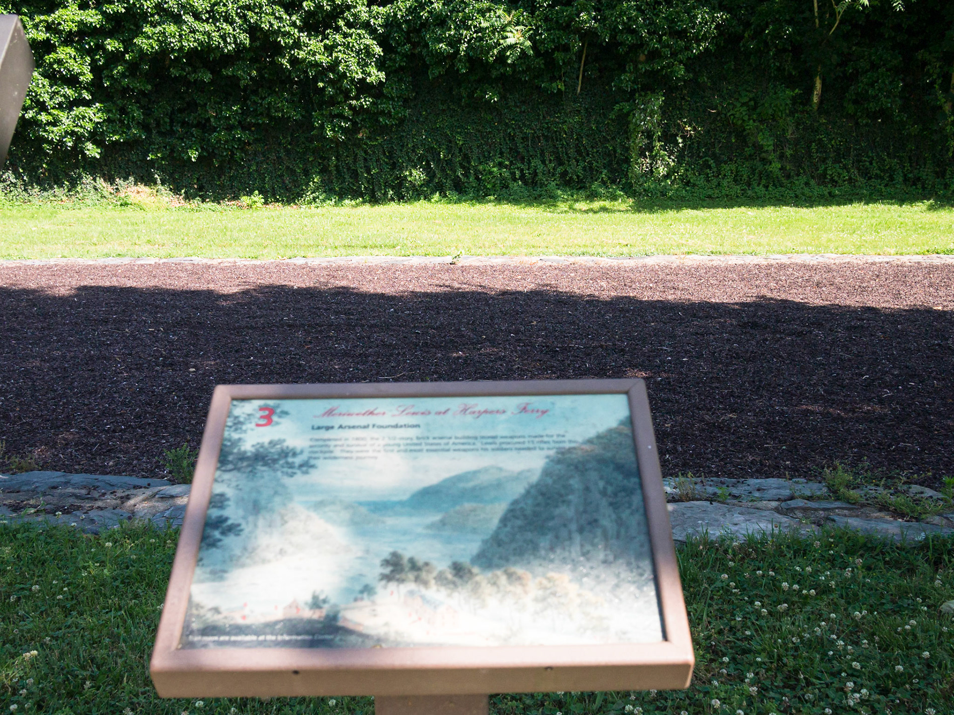 Site of the Arsenal, which stored weapons and in the Civil War was packed with weaponry. The Arsenal was a high risk structure due to the railroad trestle that ran (still runs) directly behind it. It was feared that sparks from a passing engine could blow it sky high. But it succumbed to flood waters, not fire.