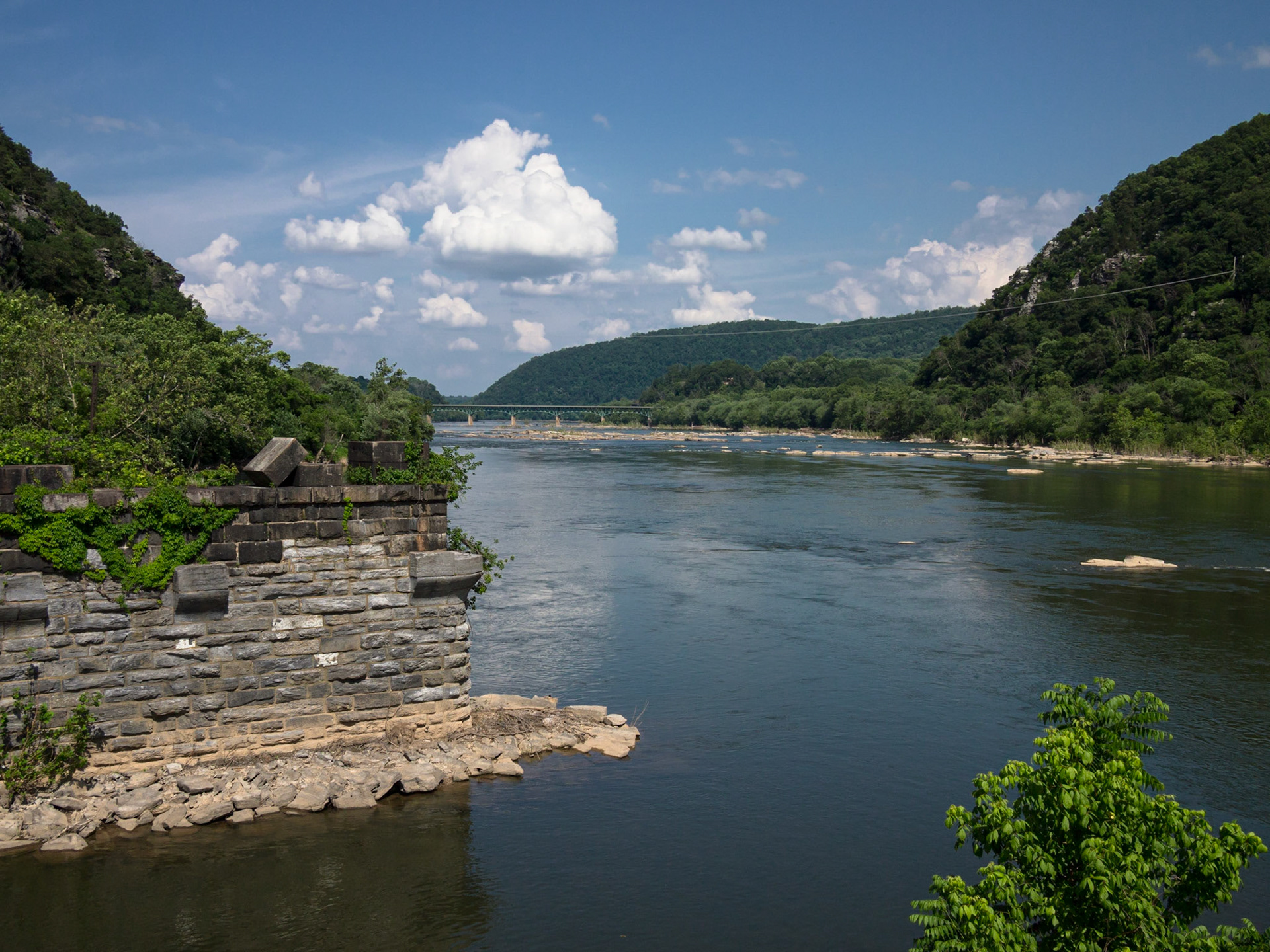 Looking down the Potomac from the point. The piers of abandoned railroad bridge are visible in the foreground.