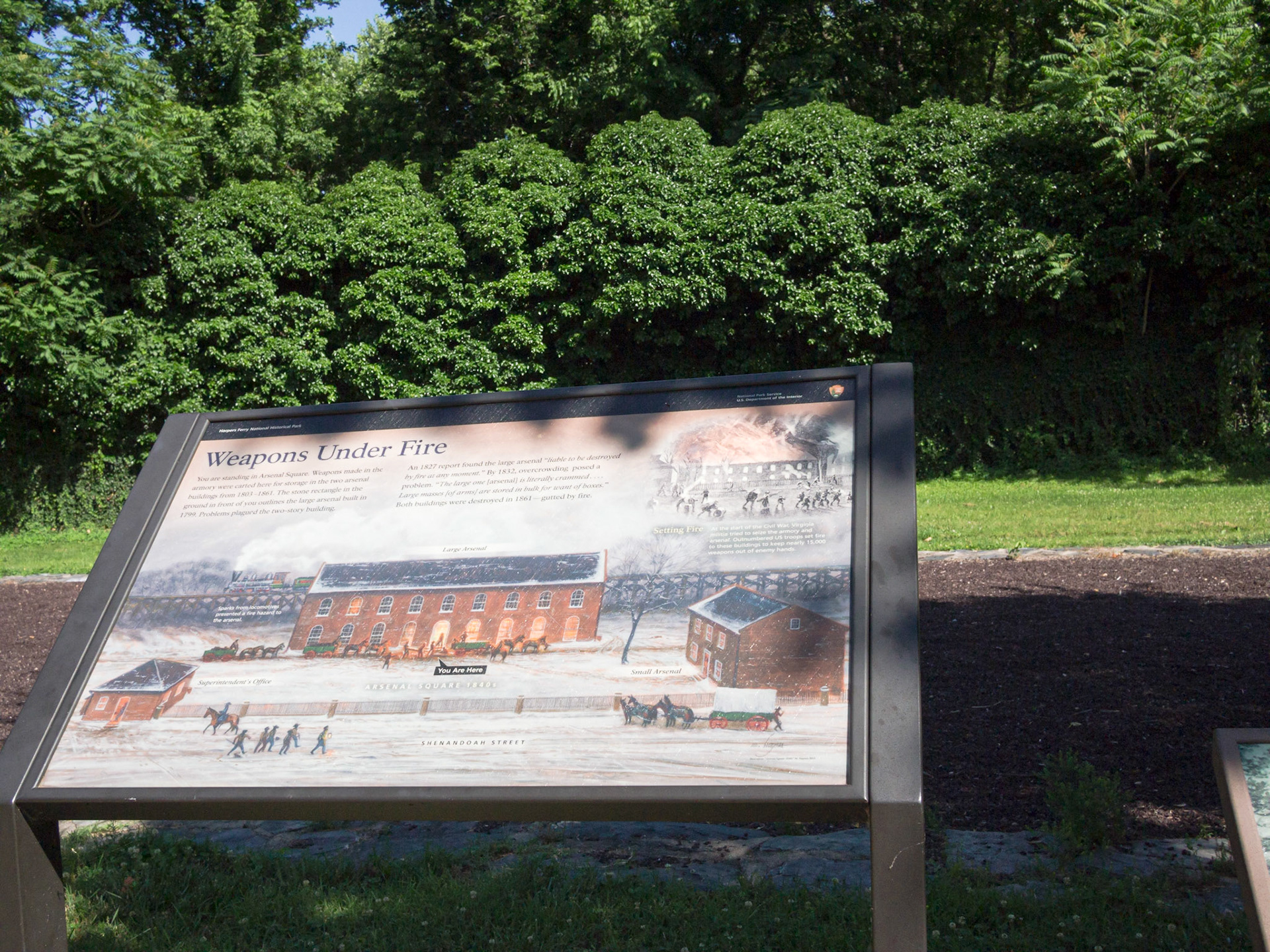 Site of the Arsenal, which stored weapons and in the Civil War was packed with weaponry. The Arsenal was a high risk structure due to the railroad trestle that ran (still runs) directly behind it. It was feared that sparks from a passing engine could blow it sky high. But it succumbed to flood waters, not fire.
