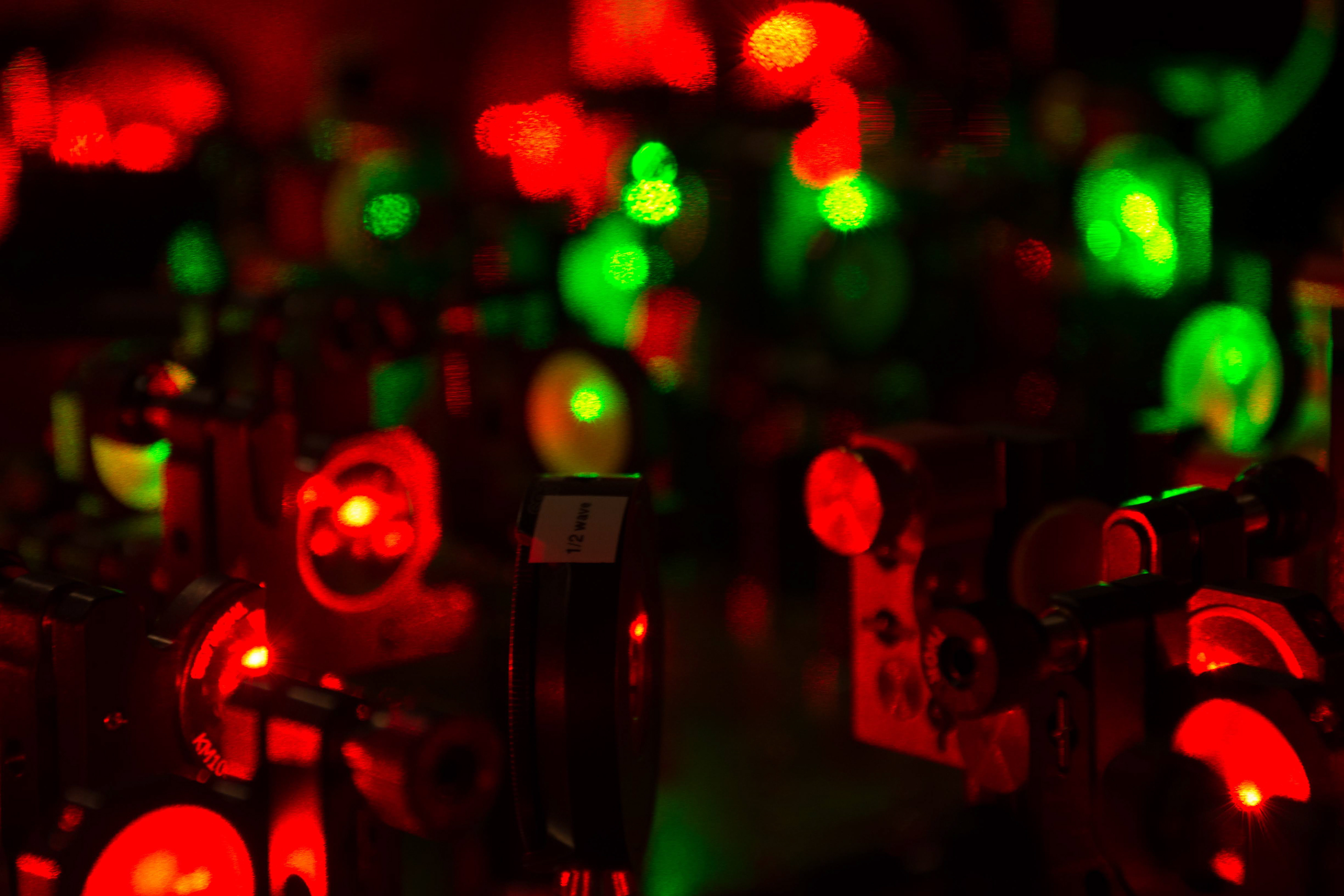 Closeup of lasers on an optical table