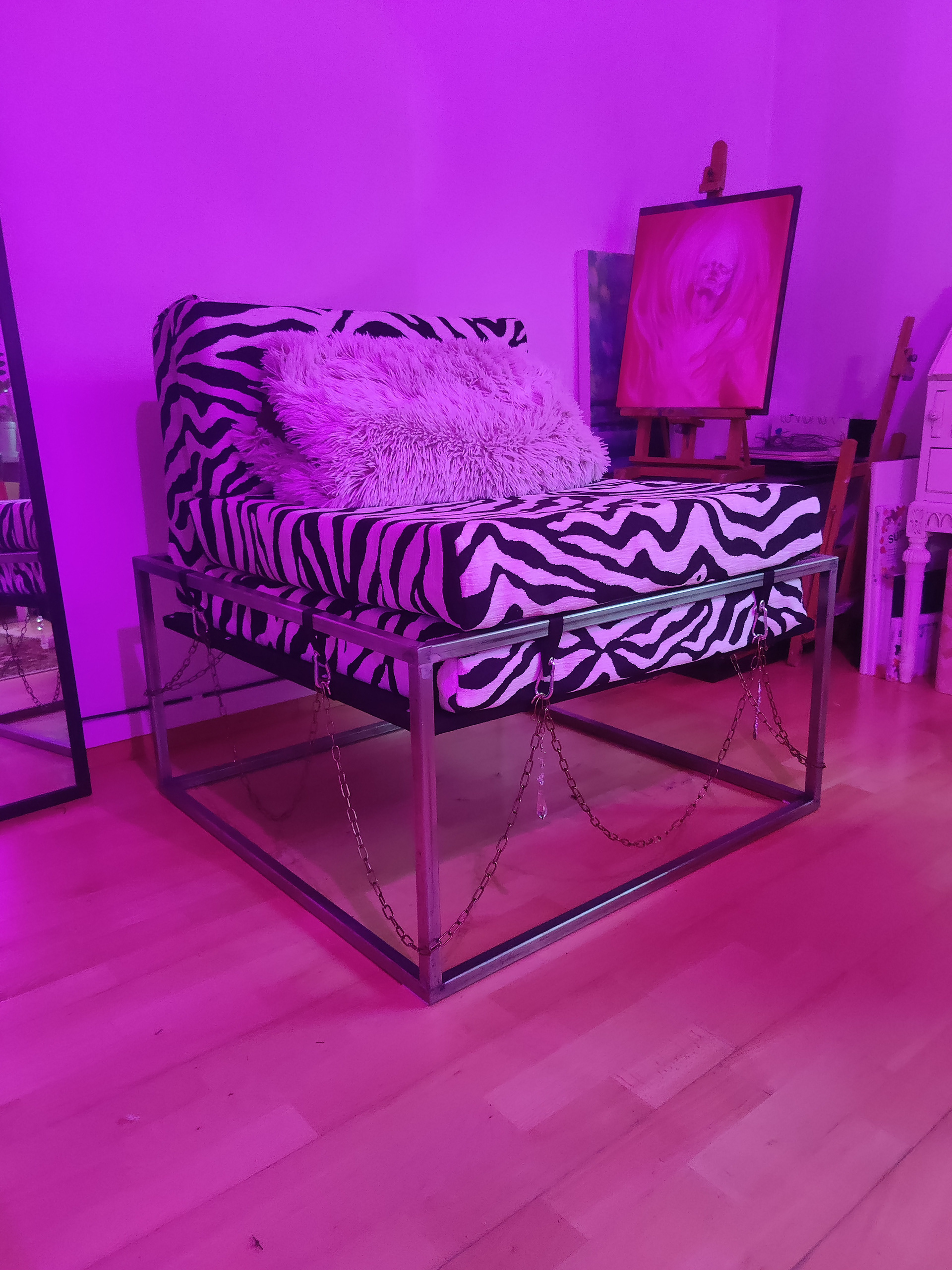 Materials: repurposed metal structure originally probably part of a coffee table. The structure supporting the mattresses are old plywood and OSB wrapped in a black fabrick.