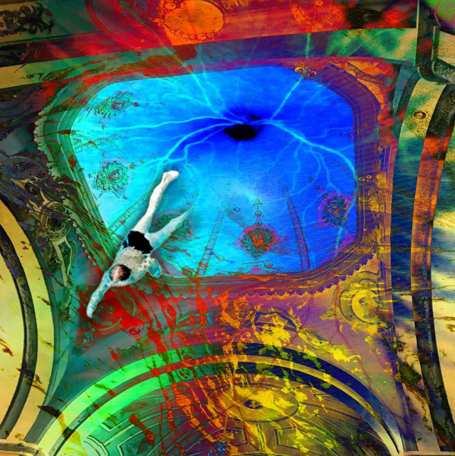A boy diving out of a blue rotunda.