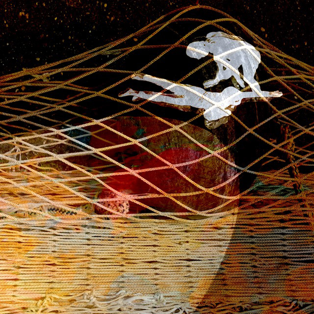 Two boys under a net.