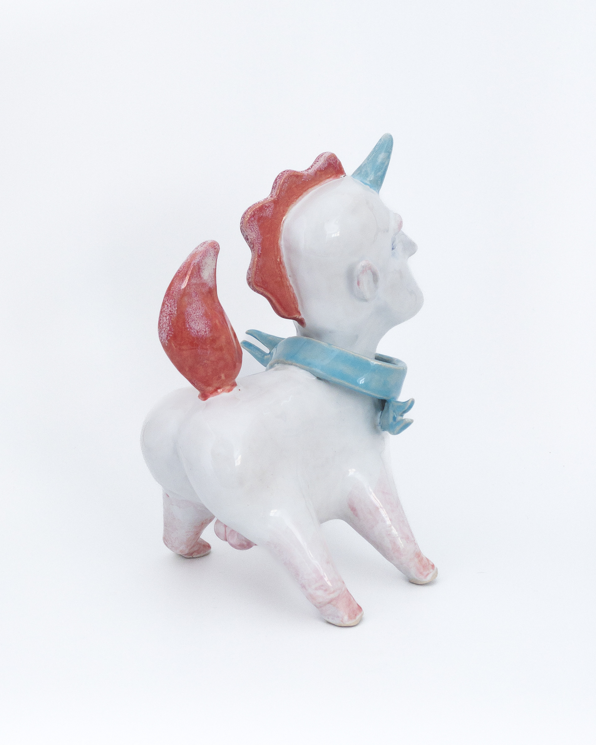 Sculpture of unicorn man in glazed ceramic