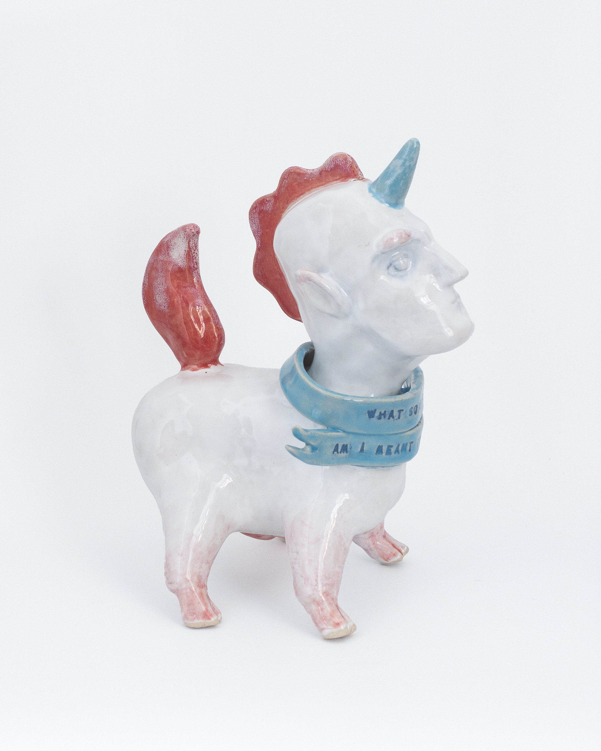 Sculpture of unicorn man in glazed ceramic