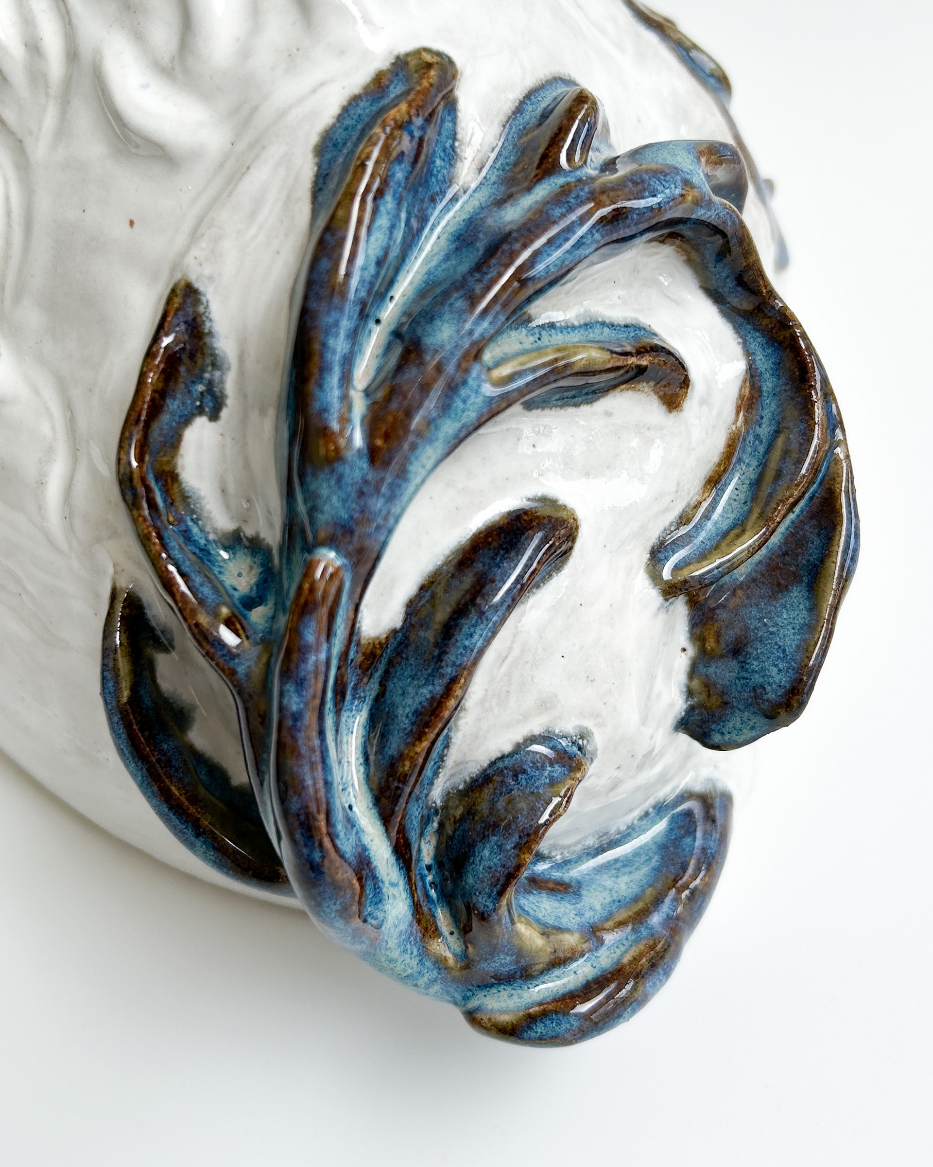 Blue and white spaniel sculpture in glazed ceramic
