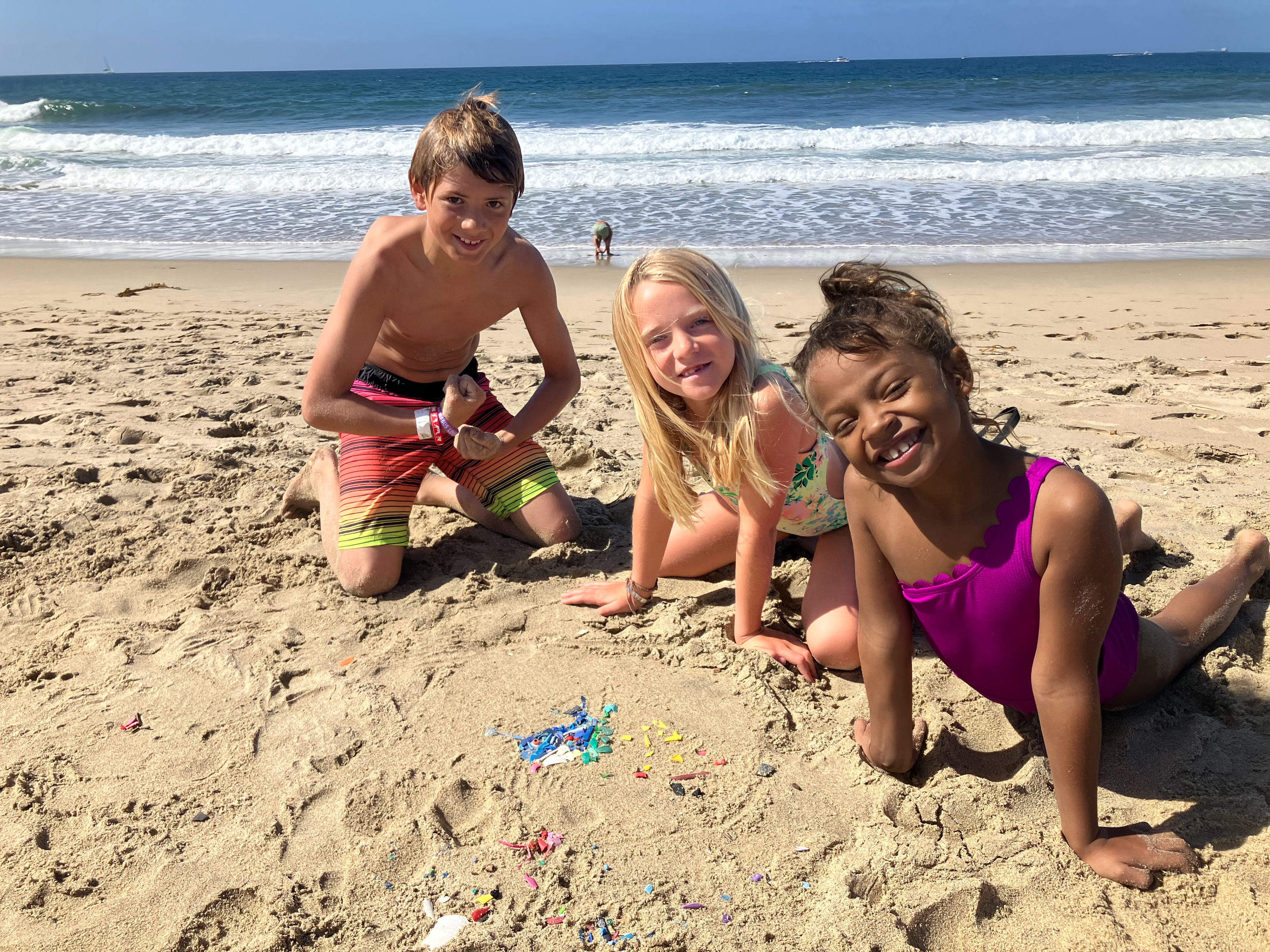 Recruiting kids to clean up plastic and build their own art before recycling.