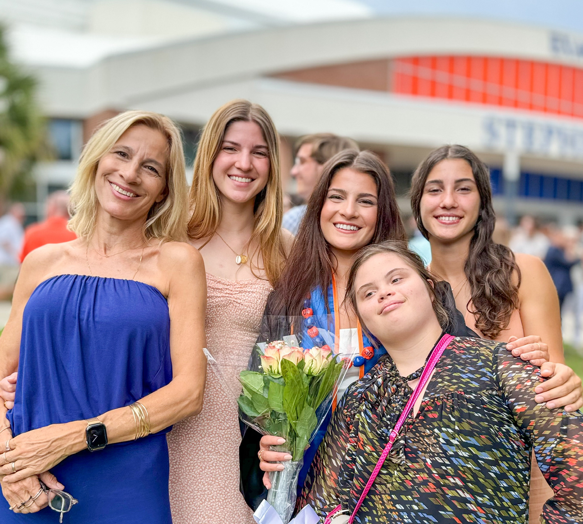 five women all smiling at UF Graduation ceremony, the Jones family.
