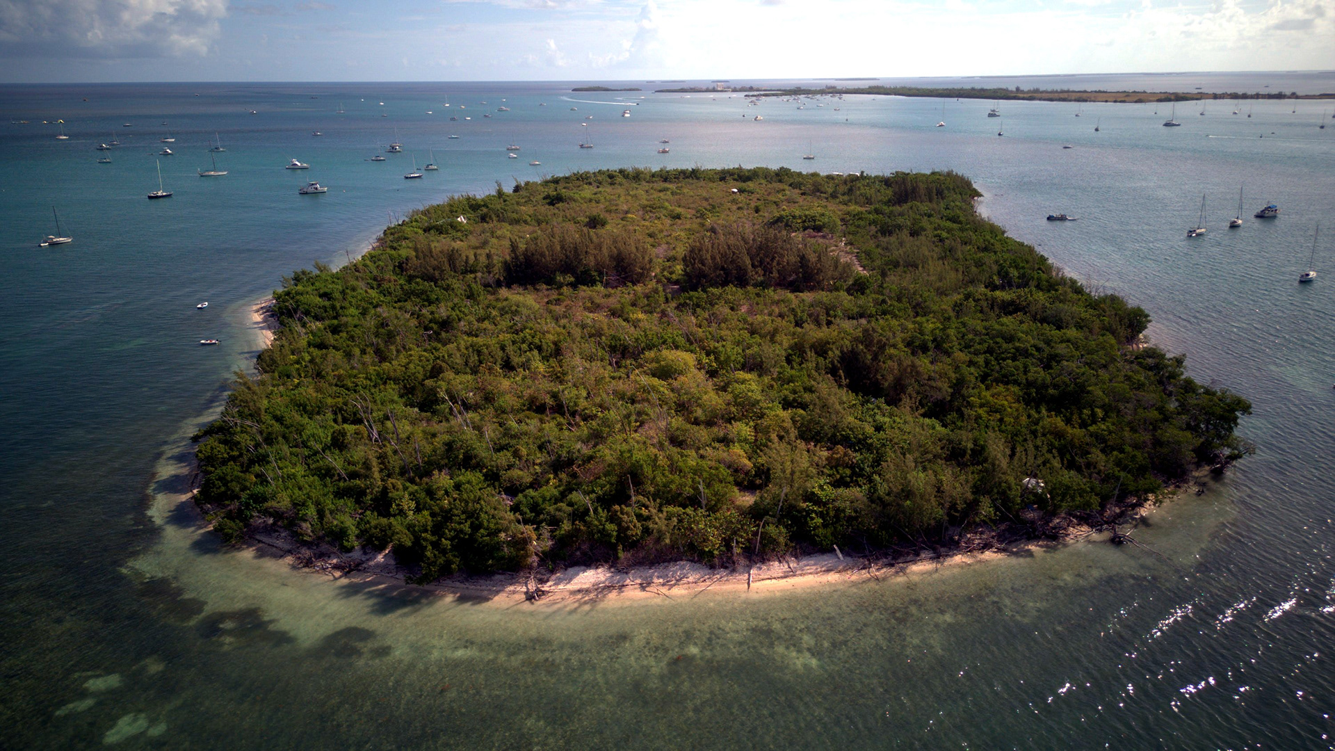 Key West 01: Aerial view of Wisteria Island off Key West ringed by turquoise water